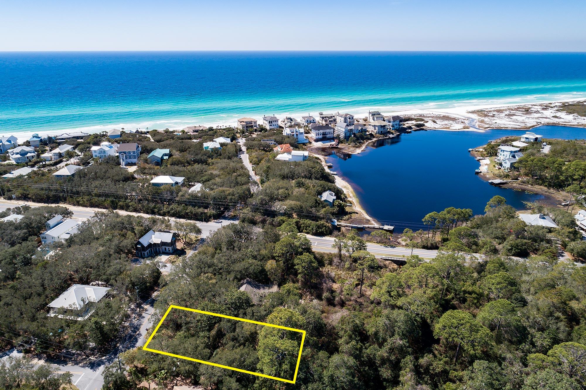 RARE, UNIQUE, and SPECIAL homesite with privacy in the rear of the lot and gorgeous views of Lake Stallworth & Gulf Views from upper floors. Also, an easy walk across 30-A to a low density beach access at the end of S. Bishop. Access to Topsail Hill State Preserve-a 1,600 state park that offers 3 miles of untouched Florida Beach with sugar white quartz sand and emerald green water,  & hiking trails with abundant wildlife and Coastal Dune Lakes. Rear of lot is very private-backs up to conservation land.