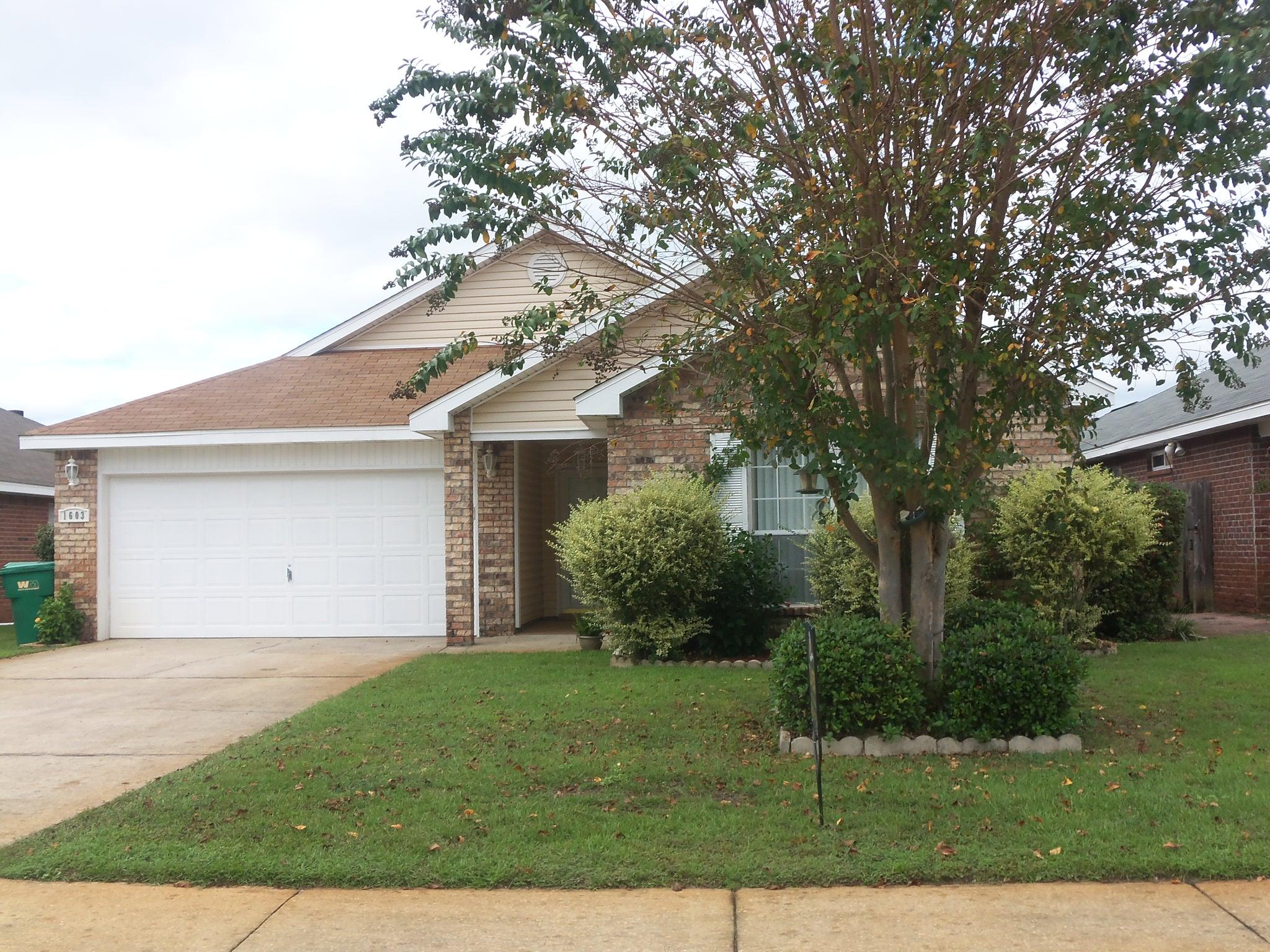 Absolutely lovely home!!! Great open design with kitchen opening into the family and dining rooms. Kitchen includes center work island, built-in desk, corner walk-in pantry, lots of cabinets and counter space. Master bedroom opens to the covered patio and the master bath includes a garden tub, separate shower, walk-in closet. Family room with large windows and gas fireplace in the corner. Ceramic tile in foyer, guest bath, and kitchen. Back yard is nicely landscaped. Small pets allowed with non-ref pet fee.