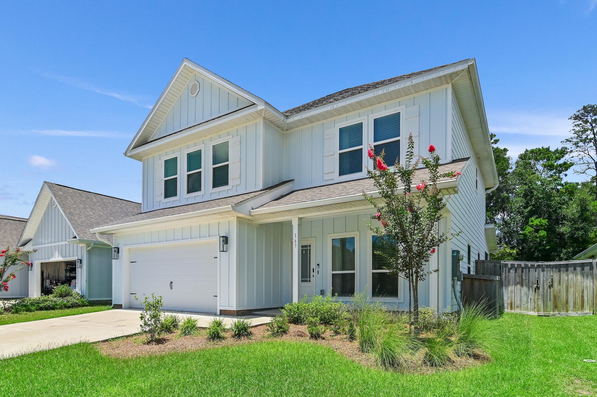Welcome to this stunning home in Santa Rosa Beach, offering 2457 ft.² of extensive living space. Constructed in 2021, this four-bedroom, four-bathroom home is perfect for families or those looking for extra space. 

As you enter, you will be greeted by EVP flooring throughout the entire home, stainless steel appliances, granite countertops, and a designer lighting package. The open, inviting dining and living spaces are perfect for entertaining. Natural light floods the home, creating a warm and welcoming atmosphere.

The master bathroom boasts a large walk in shower with a seat as well as a walk in closet. A whole house water softening system by Aqua Pro has been installed for added convenience. As you walk upstairs, there is a bonus living area that is open and inviting. Outside, there is a sizeable screened in porch, that includes a wall mounted television and an expansive backyard that provides plenty of space for children and family pets to play. Complete with a fire pit, it is the perfect spot for outdoor gatherings. Just minutes away from the stunning beaches of 30a and the shops of Seaside, this home offers the perfect blend of luxury and convenience. Don't miss out on the opportunity to make this house your new home.