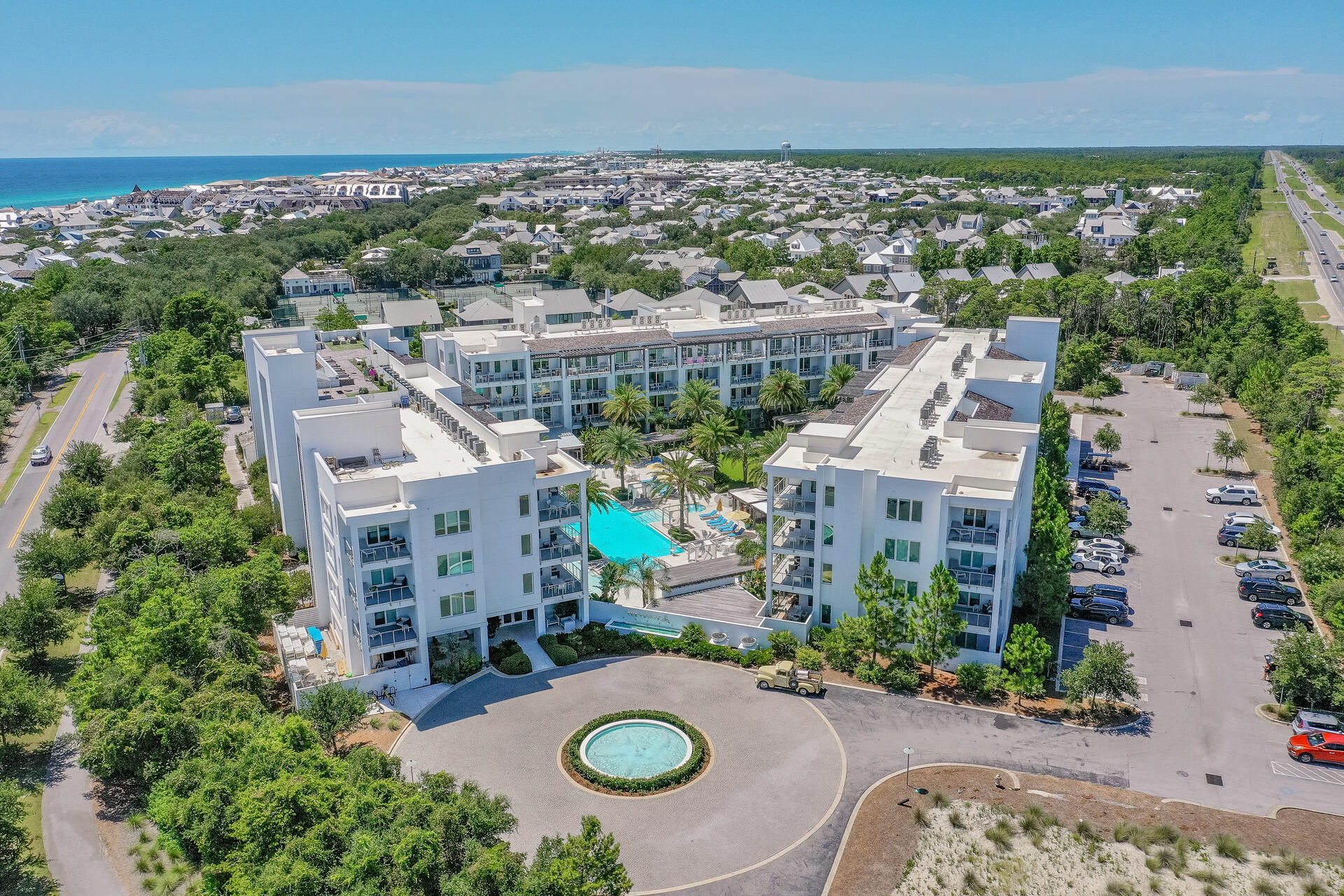 This Caribbean Pool-Front 2 bed/2 bath condo in Building 1 of The Ponte is adjacent to the Rosemary Beach community and offers direct access to the Pool, Gym and the Rooftop Bar that is perfect for enjoying the Emerald Coast Sunsets in the evening! Located at the intersection of Hwy 98 and Hwy 30A, just across the street from the shops and dining of 30 Avenue, Shades Grill and the Donut Hole, this is a coveted piece of real estate on 30A! You enter into the Welcoming Foyer that leads into the open floor plan Kitchen with Large Island, Gourmet Appliances and Recycled SeaGlass Countertops!  The Comfortable Living Room has access to the large main Balcony with plenty of seating for relaxing and eating your meals! The Main Bedroom features a King sized bed, a Desk in the nook and Private balcony overlooking the resort pool and a Spa-like Bathroom with Soaking Tub, Tiled Walk-in Shower and Double Vanity! The secondary Bedroom also includes an Ensuite Bathroom with a Double vanity and Walk-in Shower! Everything is Furnished, Move -In Ready and a Great Income Producing Property!
