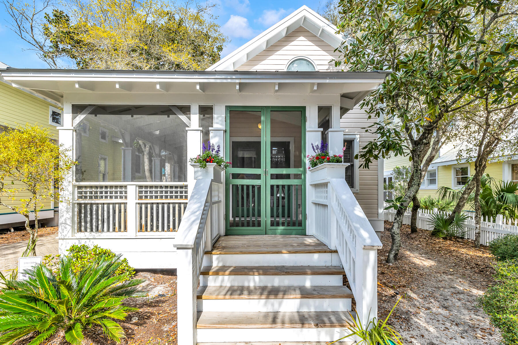 Take Five is the quintessential beach cottage, offering an envied location just four houses north of 30A and one block to Downtown's shops, restaurants, and amphitheater.  The west-end pool is a quick stroll away, and the beach is even closer!!

First to greet you is a wrap-around porch furnished for your outdoor living and enjoyment. Savor that first cup of coffee at daybreak, dine alfresco throughout the day, or enjoy a peaceful winddown at day's end with your favorite beverage.  Once you've entered the home, the ever-popular great room is exactly that!  The combined living and dining room is large, topped with a vaulted ceiling, and adorned with plenty of windows.  The adjacent kitchen with dining bar-seating, is spacious and assures everyone is included in the fun.  Two guest bedrooms, one with en-suite bath, are located on the first floor, as is the laundry facility.

The entire second floor is the master suite- bedroom with en-suite bath, dressing/vanity room, and your very own screened porch with twin chaise lounges.  This little treetop oasis affords your peace and privacy from sun-up to sun-down.

The property, which also allows for a guest house, is all about location, location, location!