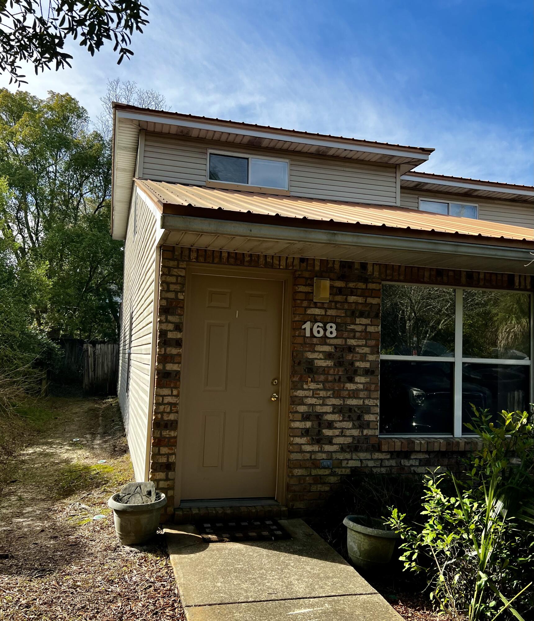 TWO STORY TOWNHOME, MASTER BEDROOM DOWNSTAIRS, TWO BEDROOMS UPSTAIRS, 2 FULL BATHS, TILE AND NEW CARPET,OPEN PATIO, CONVENIENT TO SHOPPING AND BOTH BASES. NO PETS