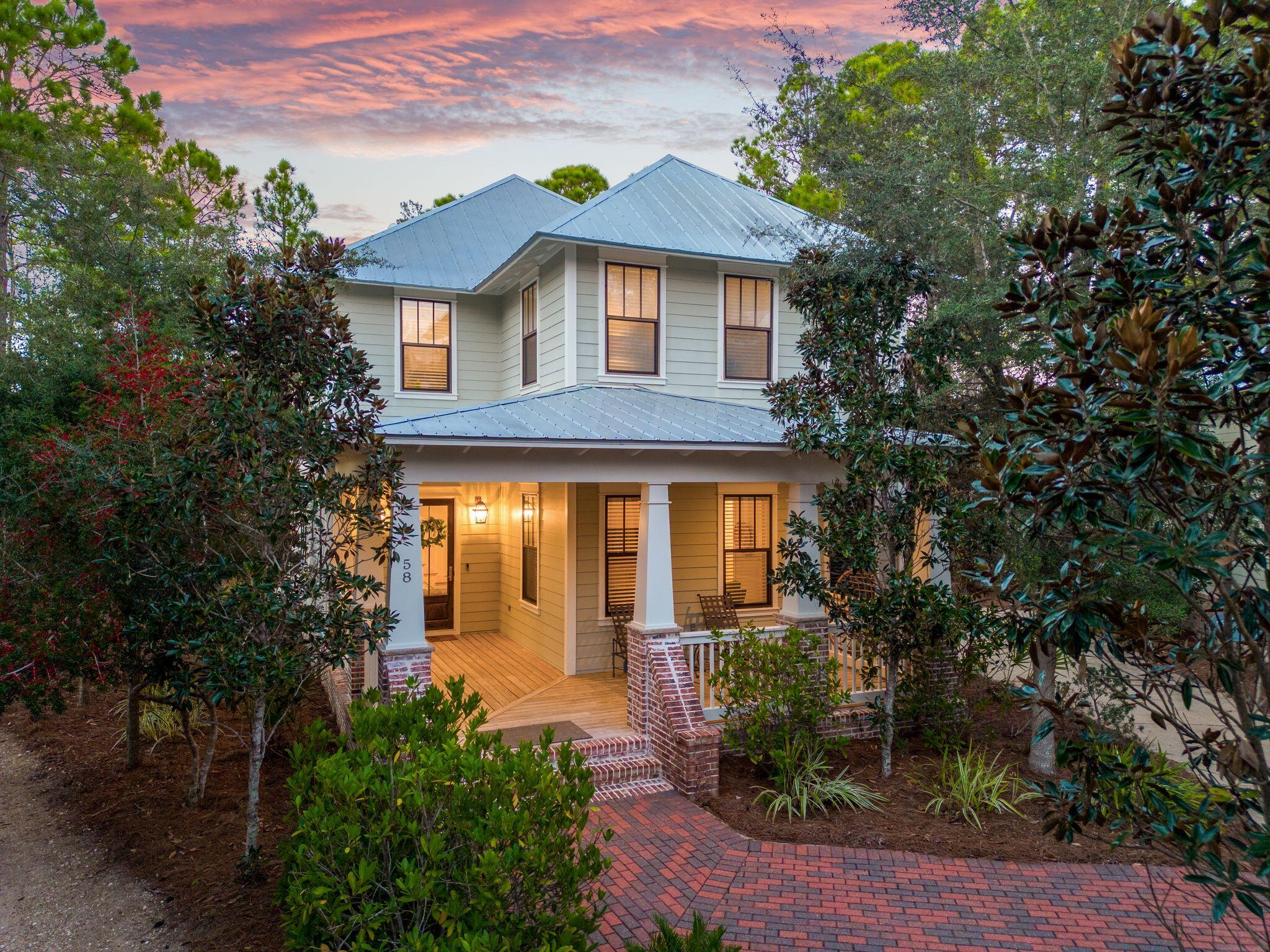 Embrace one of the most private, water-view locations in the coveted Forest Lakes community. 58 Okeechobee Circle offers the ability to live maximally and spread out both indoors and out. An expansive backyard wraparound deck looks out and leads to the community's lakeside nature trail, while many rooms indoors offer tranquil vistas of the lake and natural world around it. This amenity-rich retreat offers 4 bedrooms plus a sizeable bunk room, chef's kitchen and attached garage. The gated Blue Mountain Beach community provides a recently refurbished two-tiered pool with waterfalls, an architectural poolhouse with summer kitchen and fireplace, lakeside trails, playground, basketball hoop, all while backing to the State Forest for nature hikes and just moments from the public beach access. Furnishings are negotiable. All information is deemed reliable but should be verified by buyer.