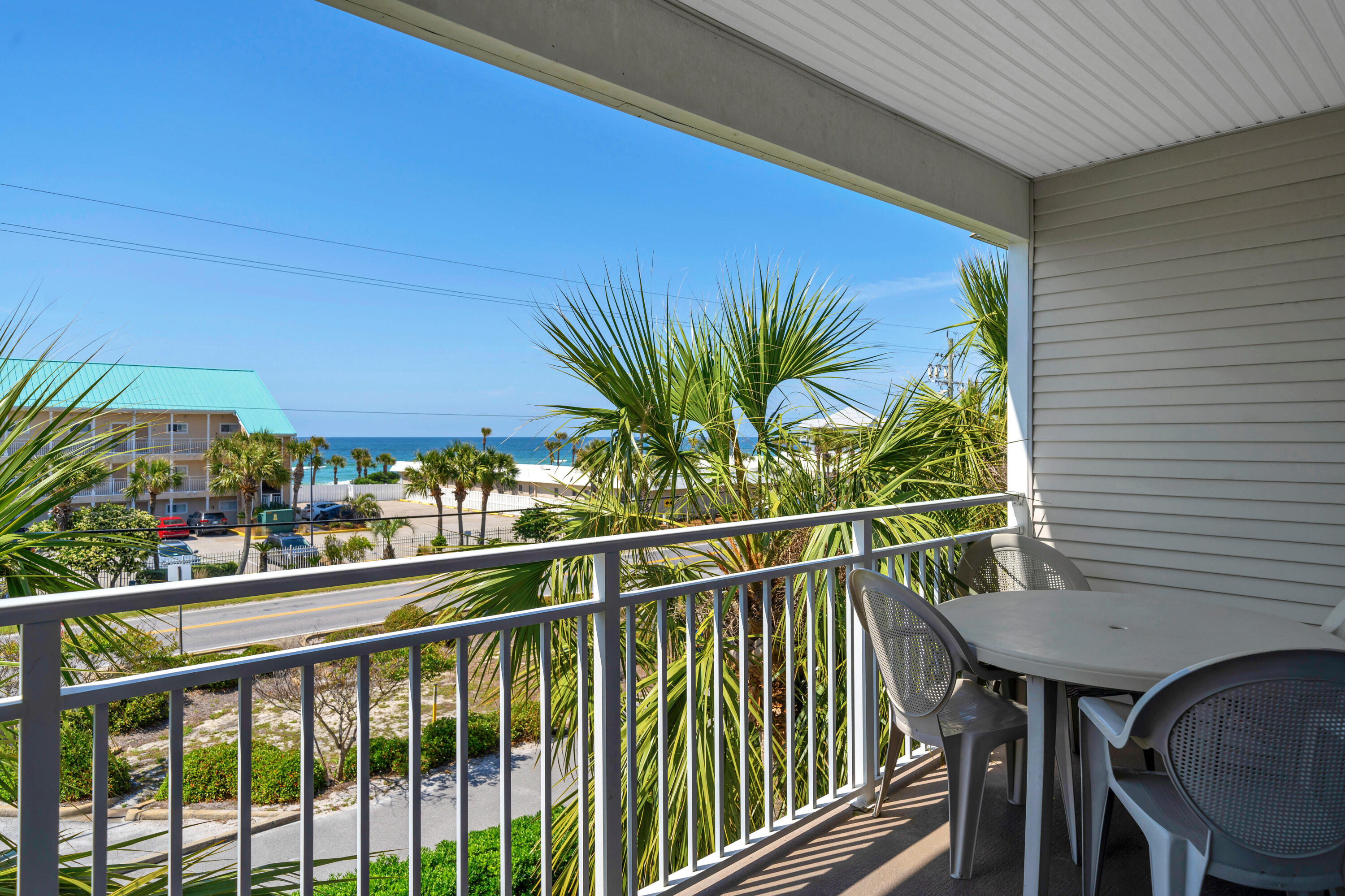 Step into coastal ease at this beautifully updated condo, perfectly situated just across the street from the sugar-white sands and turquoise gulf waters. Designed for both relaxation and investment, this residence delivers effortless style, recent upgrades, and strong rental performance. Inside, you'll find a bright  a bright open layout welcomes you with modernized lighting, a 58-inch Roku-enabled flatscreen TV, and a soothing palette that complements the surrounding seascape. The kitchen showcases stainless steel appliances and fresh interior paint, all completed within the last three years, alongside a new water heater and brand new washer and dryer. Sleeping accommodations include a king bed, hallway bunks, and a sleeper sofa, comfortably hosting up to six guests. Resort-style amenities await just outside your door. Take a dip

in the seasonally heated pool, unwind in the brand-new hot tub, or enjoy a casual evening at the community grill. Whether you are looking to generate strong rental income or enjoy your own slice of coastal living, this unit checks all the boxes with its unbeatable location, move-in ready condition and investment potential.  With average annual income exceeding $56,000.  Additional conveniences include a bike rack, new washer and dryer, and the peace of mind that comes from a completed milestone inspection with no special assessments pending.

Located just minutes from Crab Trap and Shoppes at Paradise Isle, this fully furnished condo offers the best of coastal living and investment potential all less than five minutes to the sand.