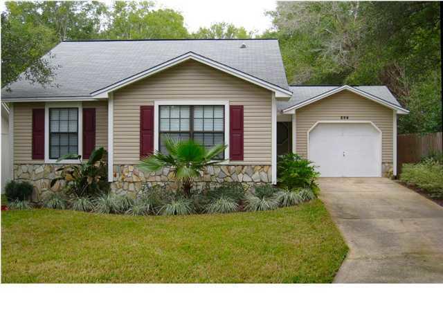 Cute home in a great location. close to some of the most highly rated schools in Florida! It's rare to find a home at this price point in Niceville. The focal point of the great room is the stone fireplace flanked by windows providing a light filled warmth to the space. An eat-in kitchen with bay windows adds to the charm. The master bedroom has a vaulted ceiling and double sinks in the adjoining master bath. Come take a look today!
