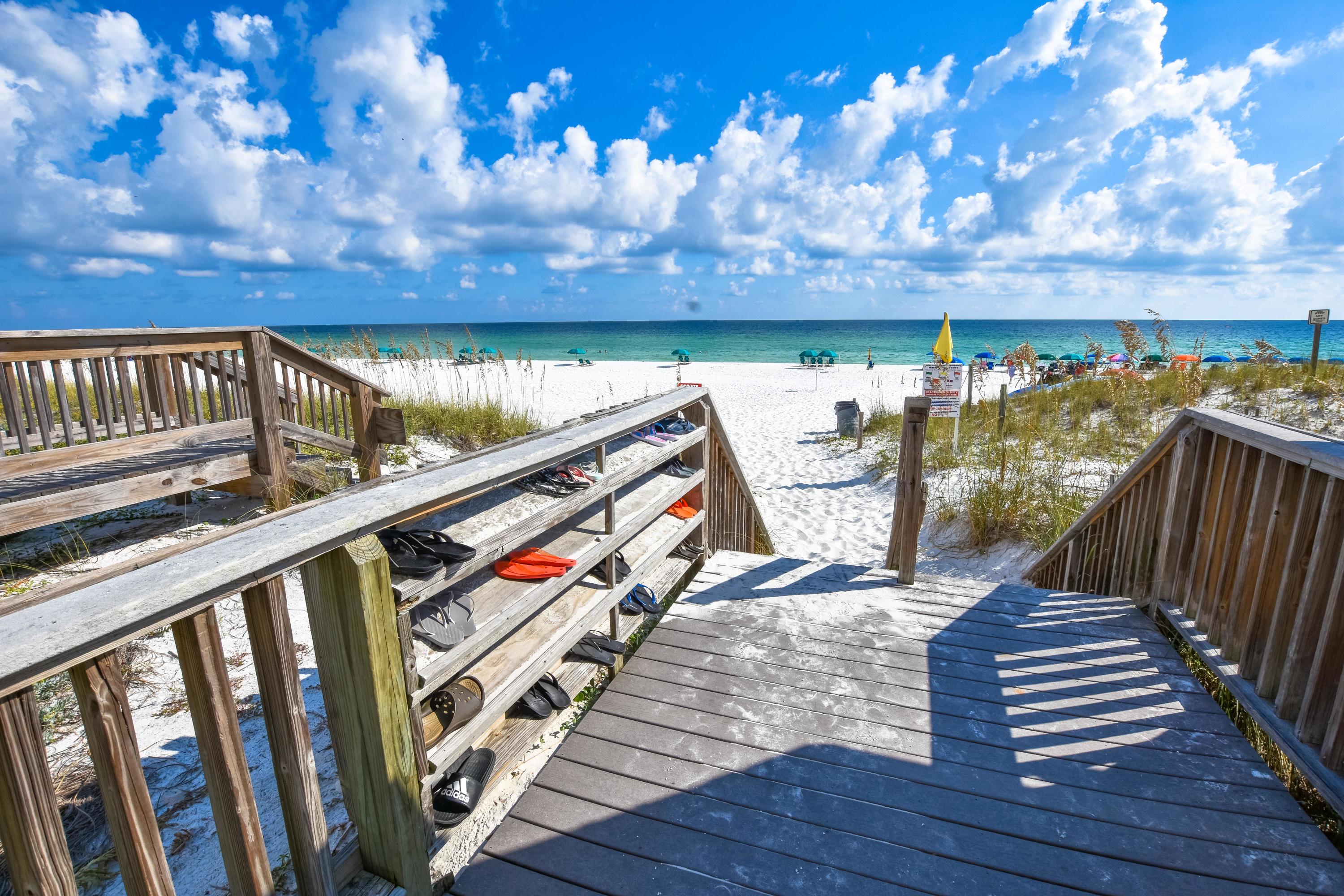 $35,000/annual rental history! This beautiful, renovated condo at South Bay is located south of Highway 98, has assigned parking at the front door, is located directly across from the pool and is a quick walk to the beautiful beach! This rental powerhouse boasts 3 spacious bedrooms, 2.5 baths including newly renovated master bathroom and guest powder bathroom in January 2020! Kitchen renovated in 2015 and includes stainless steel appliances. Step right in to the high dollar rental season with this PROVEN rental producer! Enjoy the many resort style amenities of South Bay including: 2 pools, 2 kiddie pools, 5 acre fresh water lake, lighted tennis courts, shuffle board courts, beach side volley ball, BBQ grilling area and lush grounds made for walking and enjoying the Florida wildlife! New in 2018 and 2019:  water heater, refrigerator and windows!

*Photos will be updated after winter guest leaves.  Walls have been painted a pale shade of grey not shown in listing photos!