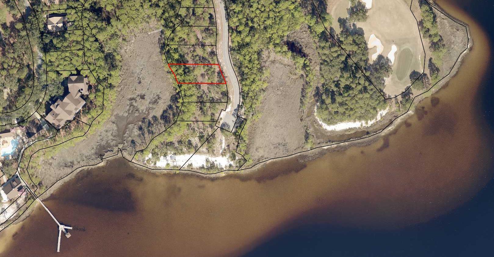 Perfect site for your dream home! This .25 acre lot is very close to beautiful Lake Powell as well as the many amenities of this master planned retreat. Wild Heron is gated and includes 734-acres in this Coastal community!  Lake Powell has the distinction of being Florida's largest Coastal Dune Lake!  Amenities include a fitness center, heated pool and hot tub, a boat house for storing kayaks and paddle boards, community dock, fire-pit and gathering area with fireplace, all overlooking Lake Powell. 24 miles of trails & bike paths are also available for the outdoor explorers.
Golf club and beach club memberships are available to purchase. Greg Norman's Sharks Tooth golf course is award winning. In addition there is a club house and hydro court tennis courts!