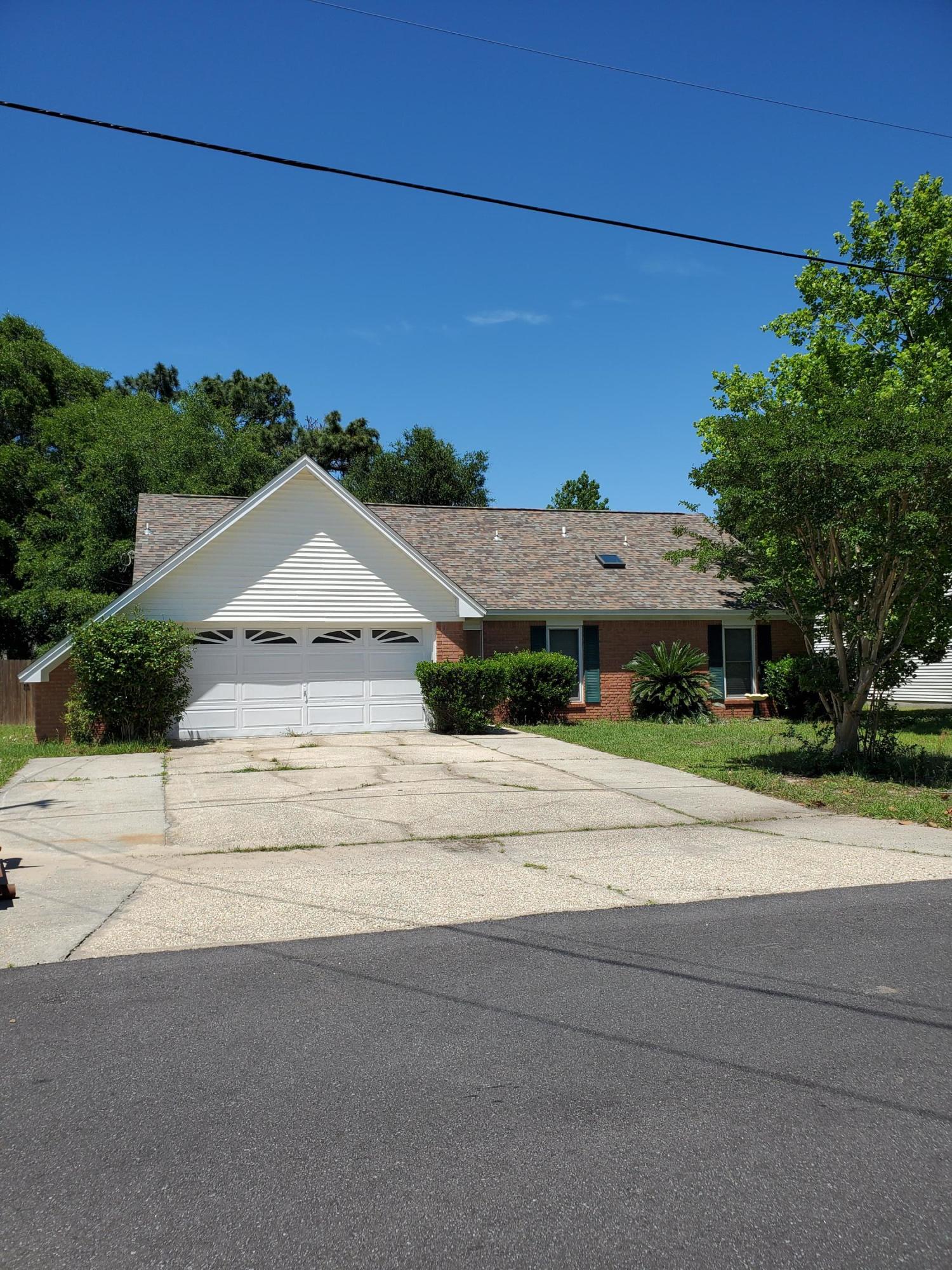 A spacious 5 bedroom and 3 bath home located at the south end of the city of Crestview with easy access to military base, Fort Walton and beaches. This home has a new roof installed in 2019 with transferable warranty, termite bonded, vaulted ceilings, new chandeliers, wood burning fireplace, and knockdown ceilings. Master bedroom has walk in closet, bathroom newly remodeled with jetted tub and light up rain shower with custom double vanity. The upstairs has 2 bedrooms, a loft and bathroom with newly tiled walk-in shower and granite counter tops. Screened patio and privacy fenced back yard. Front roads have been repaved as well. Much more and plenty of room for everyone to have their own space. This opportunity won't last long.