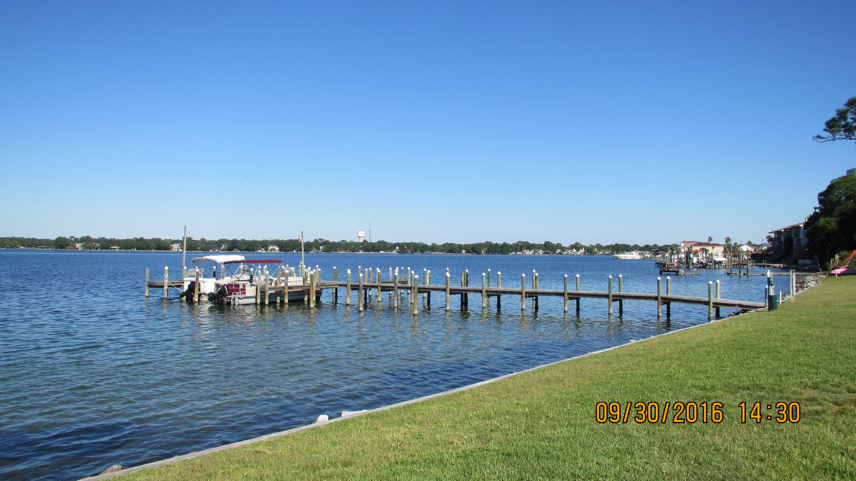 RENT SPECIAL! 2 bedroom, 2 bathroom waterfront unit that has a washer/dryer in the unit. Watch the sunrise from your living room or master bedroom every morning. There is a community pool and dock to enjoy as well. Water, sewer, trash and basic cable is included in the rent.