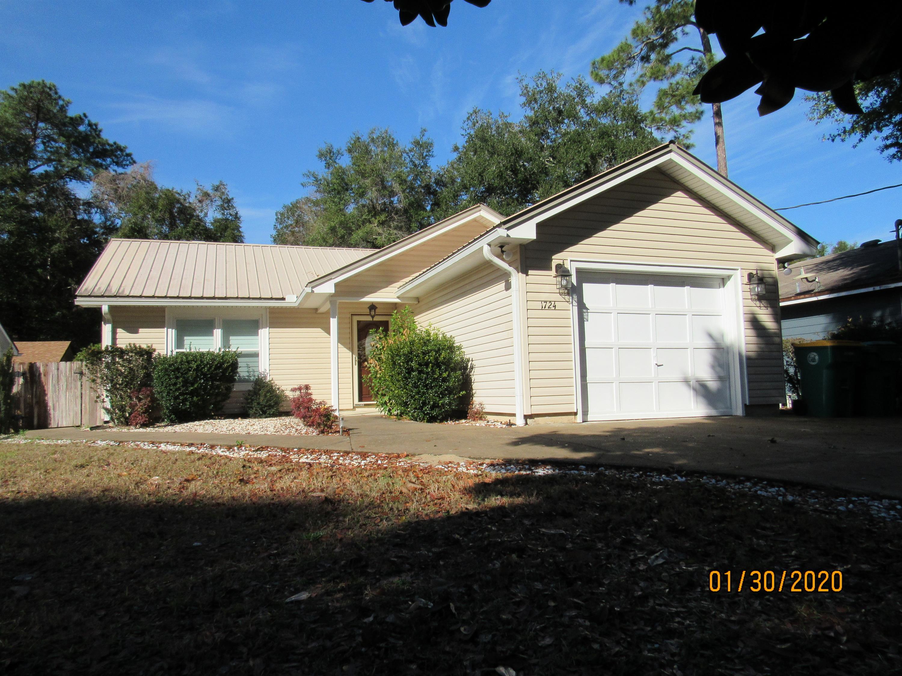 Super cute, updated 3 bedroom, 2 bath home in the heart of Niceville. This home features a split floor plan, no carpet, a garage, and a level, privacy-fenced back yard with a large deck accessible through French doors from the spacious living room or French doors from the master. The kitchen has plenty of upgrades, such as granite counter tops, stainless appliances, tile, and beautiful lighting, as well as a separate, formal dining room. The large master bedroom has a walk-in closet as well as an en suite with a whirlpool tub, separate, tiled shower, updated cabinets, and cultured marble counter tops. The two guest rooms are nicely sized and share a full guest bath, as well. Pets may be considered on a case-by-case basis with prior owner approval. No smoking. Available 10/14/2019