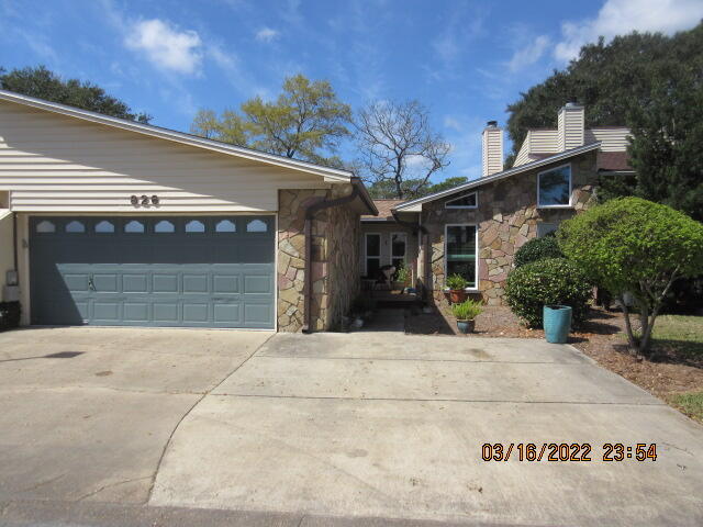 Don't miss this stunning home!!!   Everything has been updated and gorgeous!!  ONE story townhome just minutes from Medial Center and White Wilson along with both Eglin and Hurlburt AF bases, shopping and beaches.  Oversized 2 car garage with extended drive for guest parking.  Beautiful custom wood burning fireplace, vaulted ceilings, all new LVP floors, new washer and dryer(2019) granite counter tops, Subway tile kitchen backsplash All new appliances in 2019, new Rheem hot water heater (2019), new garage door opener (2019), Bidet in master bath, no popcorn ceilings and the list goes on...And don't miss the Murphy bed in bedroom 2 and built in ironing board!!! Transferable termite bond. Roof believed to be replaced in 2017.