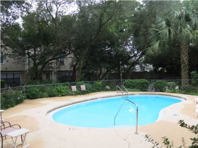 Nice Town home with two spacious bedrooms and 2.5 (renovated) baths . This quaint community offers a swimming pool. Convenient location near schools, shopping, and local cafe's. Washer/dryer hookups. No pets. No smoking.