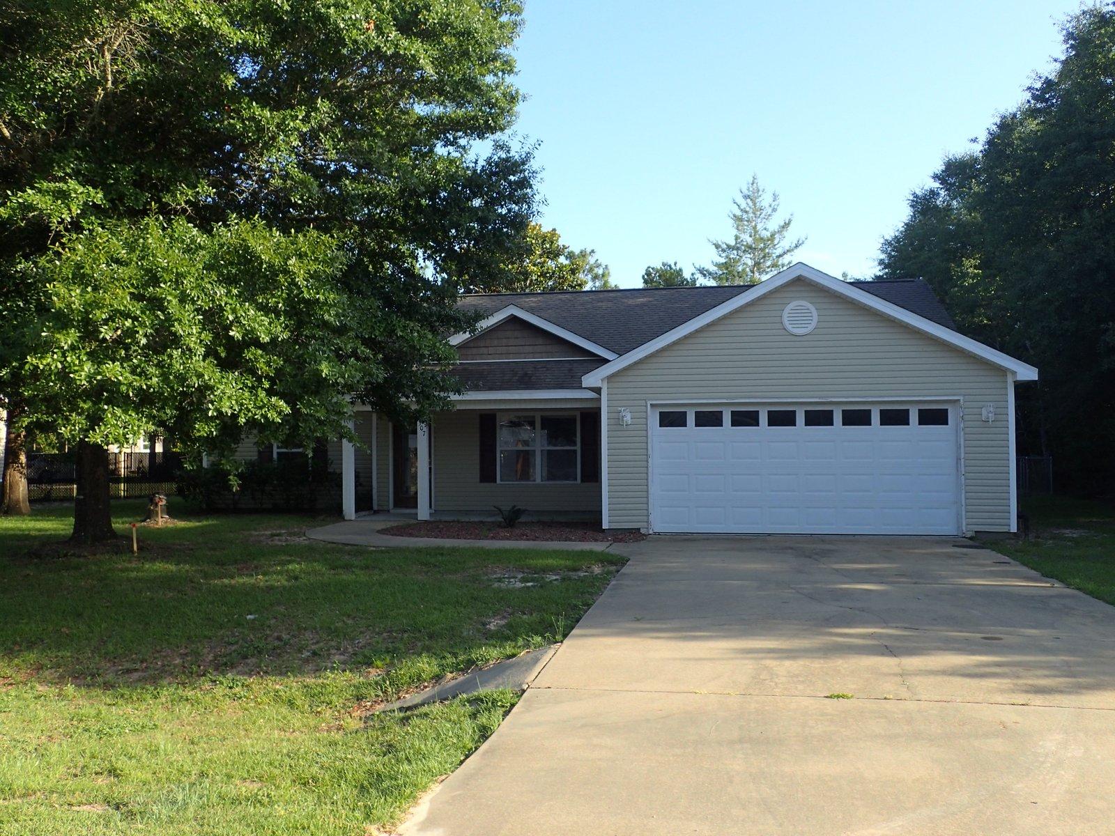 Located near the heart of Defuniak Springs, this HUD REO property has tons of potential. Built in 2008, this split bedroom design 3 bedroom 2 bath home has laminate floors, tile in kitchen and other wet areas and carpet in bedrooms. Master has coffered ceilings and master bath has walk in closet, double vanity, and tiled tub walls. Kitchen is very open with bar top and dining space. Living rooms vaulted ceiling make this home very inviting. Home has vinyl siding, 2 car garage, and chain link fenced back yard. Call today!