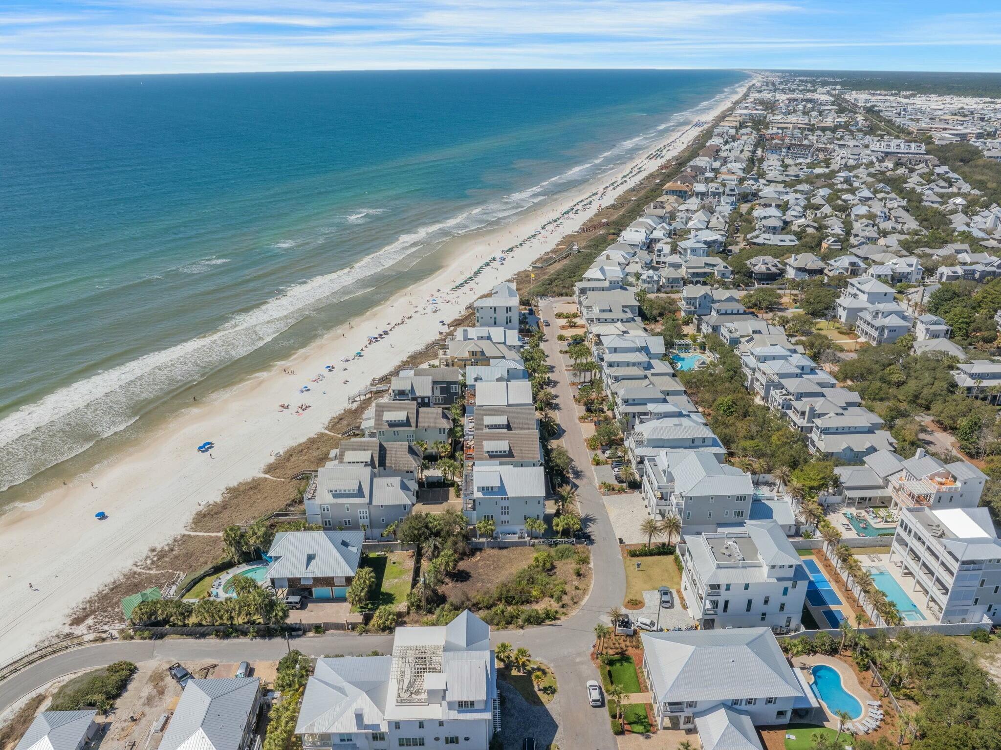 This prime corner homesite is a hidden jewel, just a short walk from Rosemary Beach. Featuring stunning views of the Gulf, this exceptional property is situated only one tier away from the Gulf of Mexico in charming Inlet Beach. For both investors and future homeowners, this opportunity is particularly attractive as there are no build-out time requirements or HOA fees. This flexibility allows you to either invest in the land now or build your dream home at your own pace, without the pressure of immediate construction deadlines. With the limited availability of homesites in this sought-after area, especially one so close to Rosemary Beach and steps from the Gulf, this unique opportunity is not to be missed. Don't miss your chance to create your own coastal retreat on one of the last remaining homesites in this coveted location!