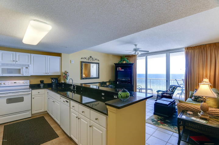 The beach getaway you have always dreamed of - a beach inspired 2/2 Gulf front condo at Majestic Beach Towers. Whether you are ready to live on the beach or invest in a rental property, this is the perfect condo for you! Perfect 5th floor elevation. Non rental and in immaculate condition. Hard surface flooring in living areas and kitchen. Gorgeous Riveting Gulf views are framed by beachy chic interiors, designed with the Gulf of Mexico and sun in mind. Sunshine and warm gulf breezes abound from the generous balcony, with amazing water and beach views. The gourmet kitchen features loads of cabinet space and is fully stocked and rental ready and the rest of the condo lives larger than its square footage and is spacious and bright.