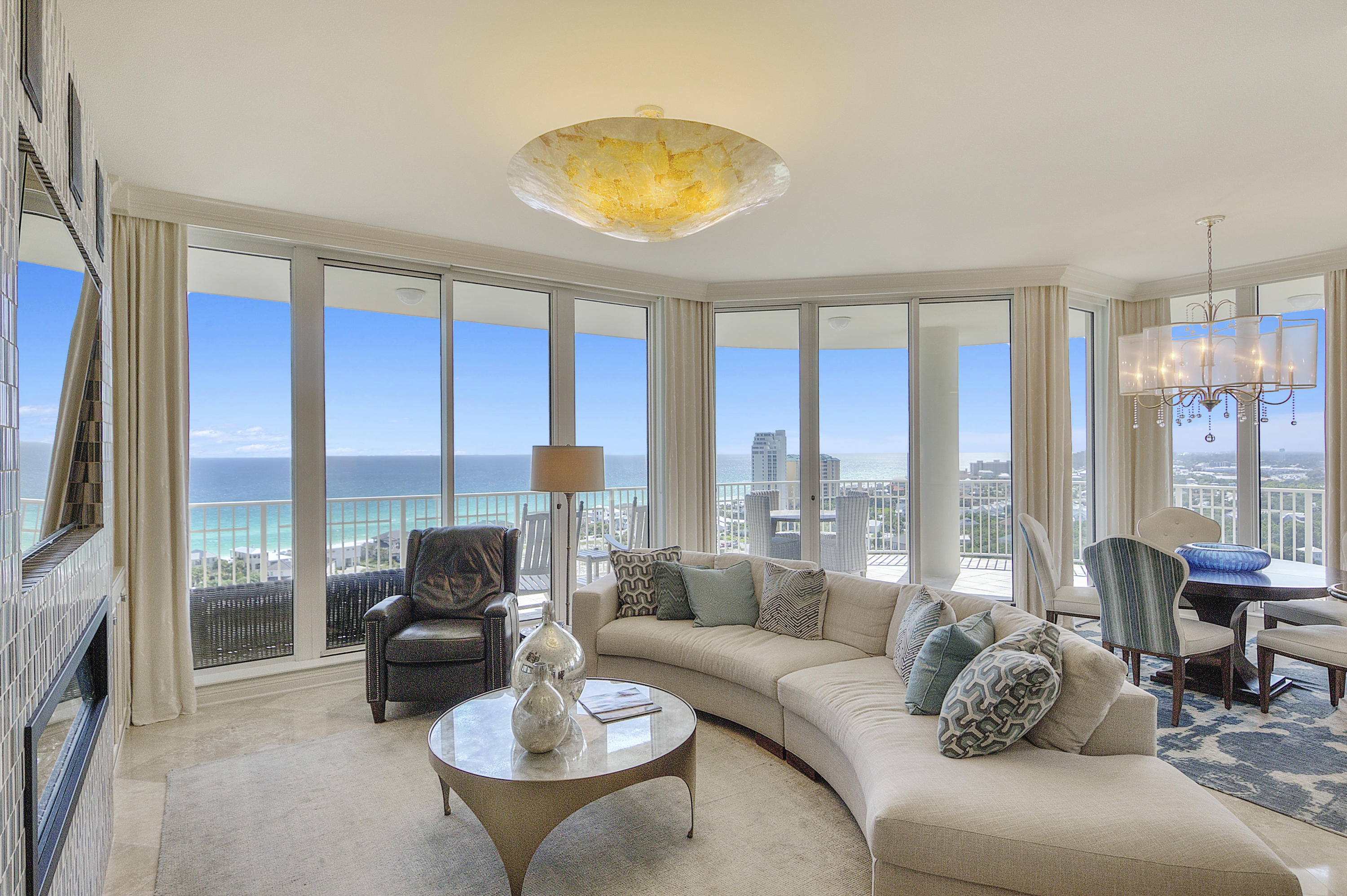 Extremely RARE opportunity to own in the preferred west end location of the area's most luxurious private residence community with a separate, highly coveted, poolside cabana! Located in One Beach Club, and offering the very best views and amenities available. From every room of this well appointed residence, you will enjoy various expansive views of the Gulf of Mexico, the Choctawhatchee Bay, the golf course, and marina. Tastefully remodeled throughout and beautifully furnished with the finest finishes, lighting, and accessories from Lovelace Interiors. The Kitchen is a chef's dream featuring top of the line appliances including Sub Zero Refrigerator and Wine Refrigerator, Wolf Double Ovens, Wolf Induction Cooktop, separate island for food prep, and pantry. The Master Suite offers amazing gulf views, balcony access to enjoy the waterfront setting, separate his and her california closets, and a split bedroom floor plan for privacy.  Three additional bedrooms offer serene views of the bay, and include full baths as well as balcony access.  Complete laundry room with built in cabinetry for storage and separate laundry sink.  Simply too many features to list, this one is a must see.  Owners will enjoy access to One Beach Club's private fitness center, media center, pool, hot tub and outdoor kitchen area.