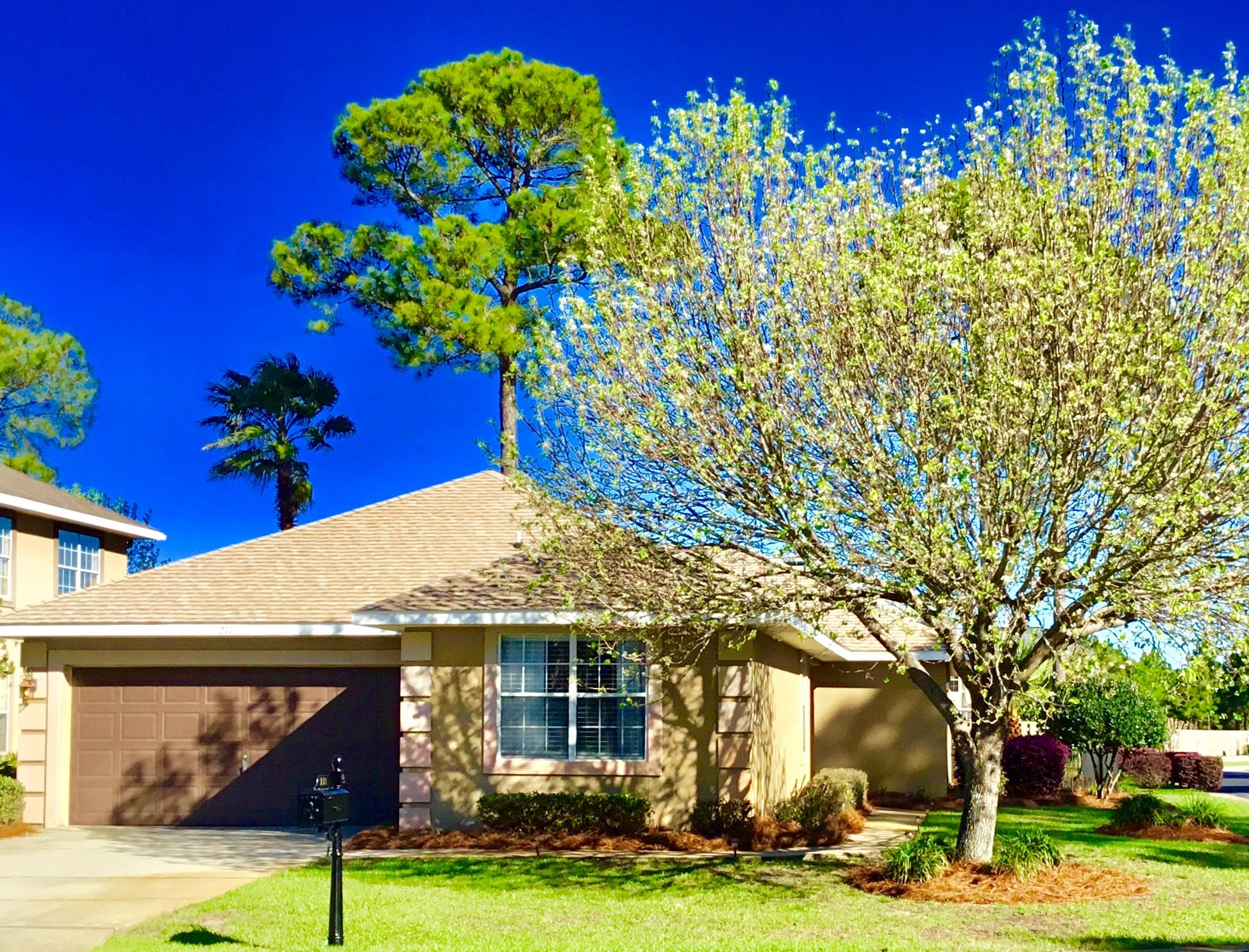 A JEWEL & Almost Never Lived in! Must See. Spacious 1 Level Home w/double car garage in gated, convenient Destin, FL neighborhood. TOTALLY RENOVATED 3 bedroom (2-1/2 bath home) With Beautiful Hardwood floors, Gas Stove, stainless steel appliances & Tasteful Amenities Throughout. Large Fenced Backyard on one of the best streets in neighborhood. HOA fees under $100 monthly & located in gated community minutes to shopping, restaurants, beaches, and entertainment. Community Offers Large Pool, Basketball, Swings, Tennis Courts and Picnic Pavillion. Don't forget the important main traffic light for very easy in-out convenience.NEIGBORHOOD Pool, tennis, basketball, swings, & picnic with paved walking trails around the lakes with beautiful fountains. Samsung W/D to convey with home. Seller has a 6 mo service agreement with 1 Hr Heating/Air, Airconditioning is approx only 1 yr old. Home has Oxy Quantum Air Quality System for Cleaner Air. The roof has just had a Windstorm Mitigation Inspection Verification. (WDI).