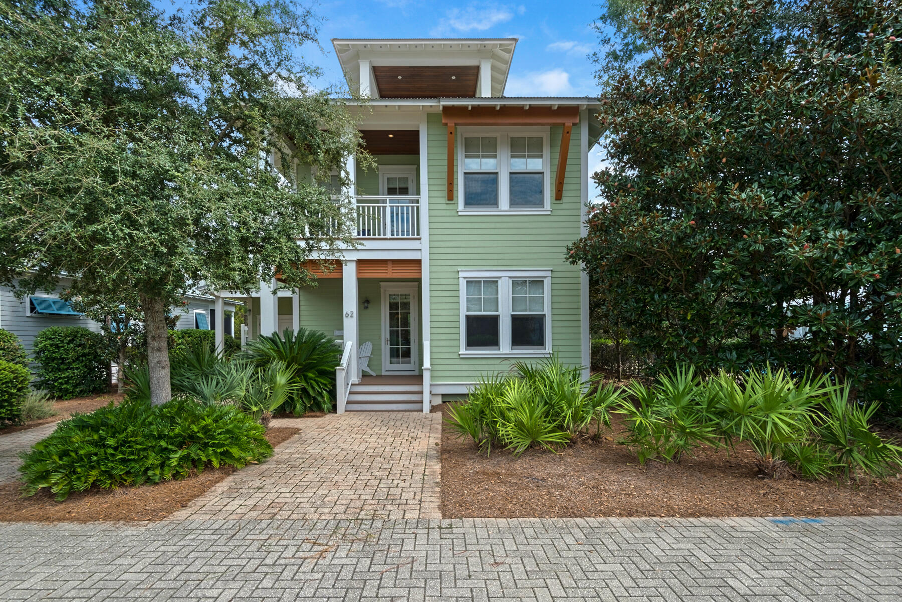 Discover 62 Morgan's Trail, a coastal retreat built by Rice Construction, located within the gated neighborhood of The Preserve at Grayton Beach. This immaculate 4-bedroom 4.5 bath home with 5 porches, brick paver terrace and enclosed livable tower is being offered fully furnished with closing no earlier than March 19, 2022.  Quality construction including concrete block piers. 62 Morgan's Trail sits on premiere Lot 1 adjoining the Grayton Beach State Park Preserve, one of two neighborhood pools, and is a short walk to the deeded beach access. Embrace gracious living in this never before rented home with hard surface flooring throughout including solid wide plank oak hardwood and pecky cypress ceilings which punctuate rooms and accentuate the 5 porches.  The front porch opens into a a welcoming foyer. The first-floor en suite bedroom with soothing palette is ideal for multi-generational living.  The gas fireplace with custom mantel anchors the living room and is framed by window seat niches. The open kitchen with windows features high end appliances and a curved island with vegetable sink offering intimate seating for two. Doors from the living area open onto a large porch with IPE Brazilian hardwood. Outdoor draperies may be drawn for intimate al fresco dining.  Sit under the stars on the terrace and gaze at the night stars and listen to the sounds of the forest or take in the sunset from the third-floor tower room balcony and listen for gulf waves. The Master Bedroom touts soaring ceilings, window seats, custom built ins, a large customized walk-in closet and bath with tub, separate shower, water closet and dual vanities.   Second-floor guest bedrooms share a west facing porch overlooking the streetscape. Nine Windows allow light to flood the third floor heated and cooled tower room ideal for a studio/study office, sleeping quarters or secondary living room.  The eye pleasing tower room features a wet bar with under counter refrigerator and cabinetry and it lets on to the sunset porch.   The first-floor laundry room also accessible from a side entry is complete with cabinetry, countertop and sink.  There is ample storage inside and out and an enclosed outdoor shower. Don't miss this opportunity to live and play in The Preserve at Grayton Beach with two neighborhood pools, and two tennis courts minutes from fine dining, shopping, historic Grayton Beach and coastal towns.  62 Morgan's Trail is the perfect place to connect with family, friends, nature, the beach and all 30A living has to offer. Make your appointment today to see this beautiful home which may be enjoyed as a year round residence or vacation-second home.  Buy now and close March 19, 2022.