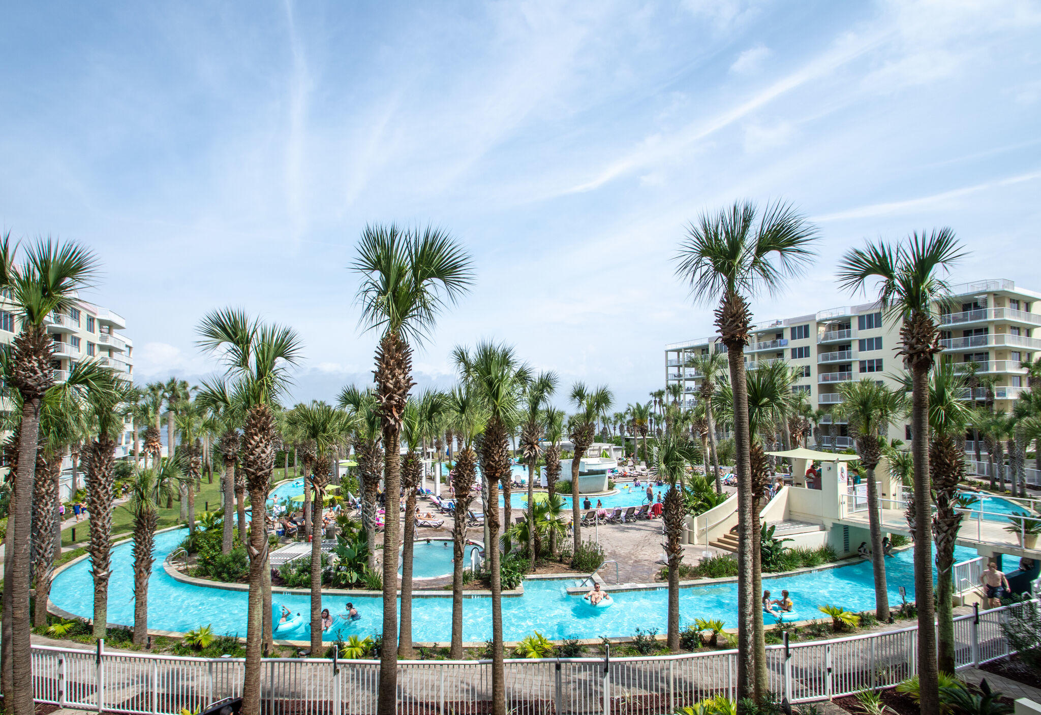GORGEOUS VIEWS OF THE LAZY RIVER!!! This two bedroom plus private bunk room features crown molding, granite countertops and much more. It was never rented. The unit is being sold furnished, floors are tile throughout. The balcony is accessible from the living area & master bedroom. The master bedroom suite has a luxury bath while the second bedroom & bunk room share the second bath. There is a stackable washer & dryer for added convenience. Destin West Pelican sits next to a large courtyard encompassing the Lazy River, two private heated pools, a zero entry pool & a large heated pool with a fun waterfall.