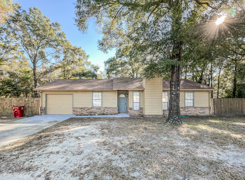 Available NOW....3/2 with easy commute to bases, beaches, & shopping. Large lot features a 1 car garage, privacy fenced back yard with yard building. Wood burning fireplace, breakfast bar, galley kitchen and large laundry. New paint throughout the home.  Clean and affordable. No inside smoking or vaping. Pets will be allowed with a $400 non-refundable pet fee and owner approval.