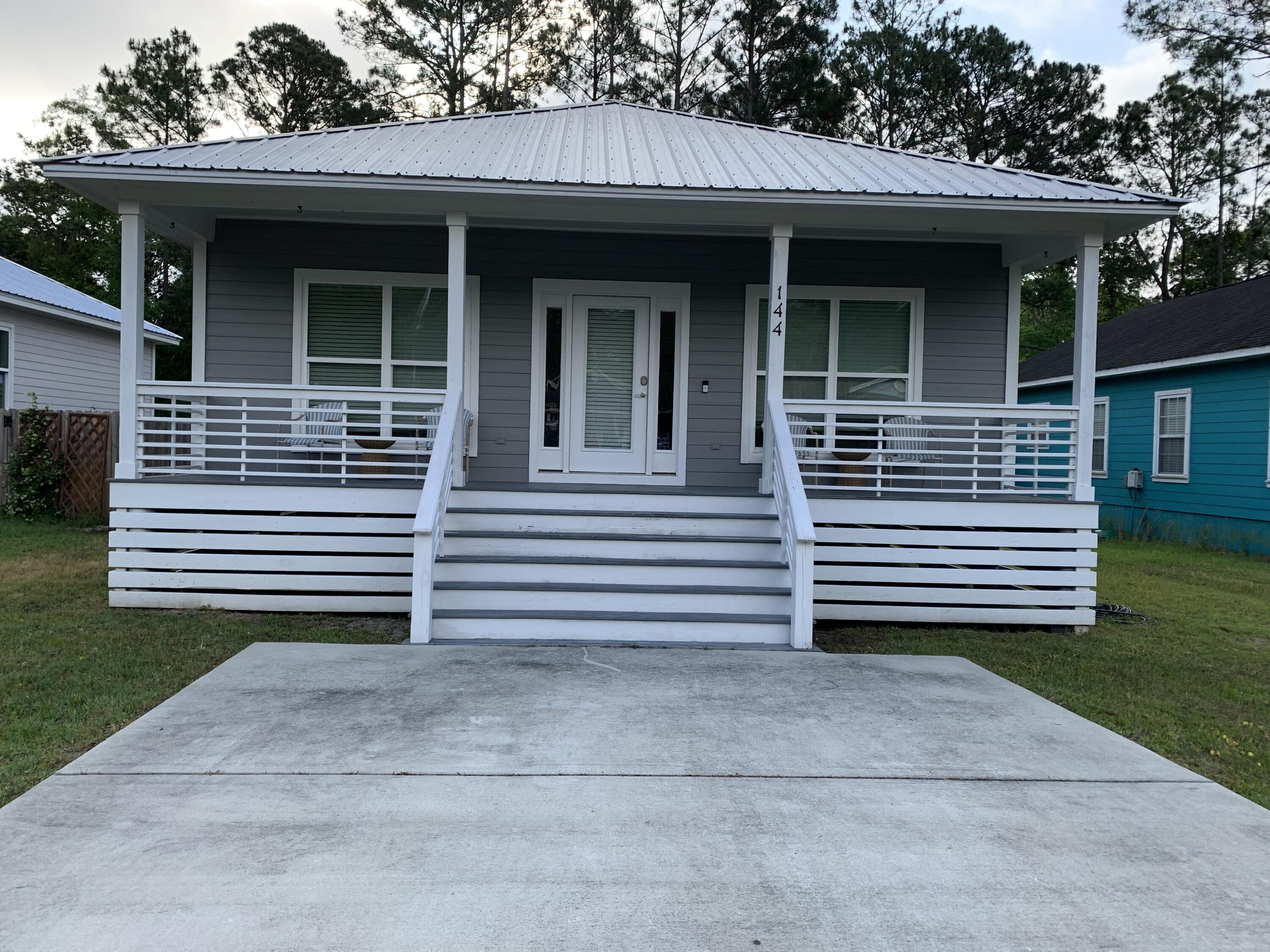 This is an adorable 3-bedroom 2 bath home has a great Cottage feel with a large front porch area for relaxing and visiting. This home boosts an open concept space when you enter the home. The modern kitchen is open and airy and features granite countertops, a large pantry, beautiful kitchen backslash and an island for cooking while enjoying the family or guests nearby in the big open living and dining space. The master bedroom has a large bathroom and a large walk in closet. The 2nd and 3rd bedrooms also have large closets, ceiling fans & blinds. All flooring is the LVP!
Fully fenced back yard with side and back porches for an added touch of outdoor enjoyment. Home sits above the ground and has a crawl space.