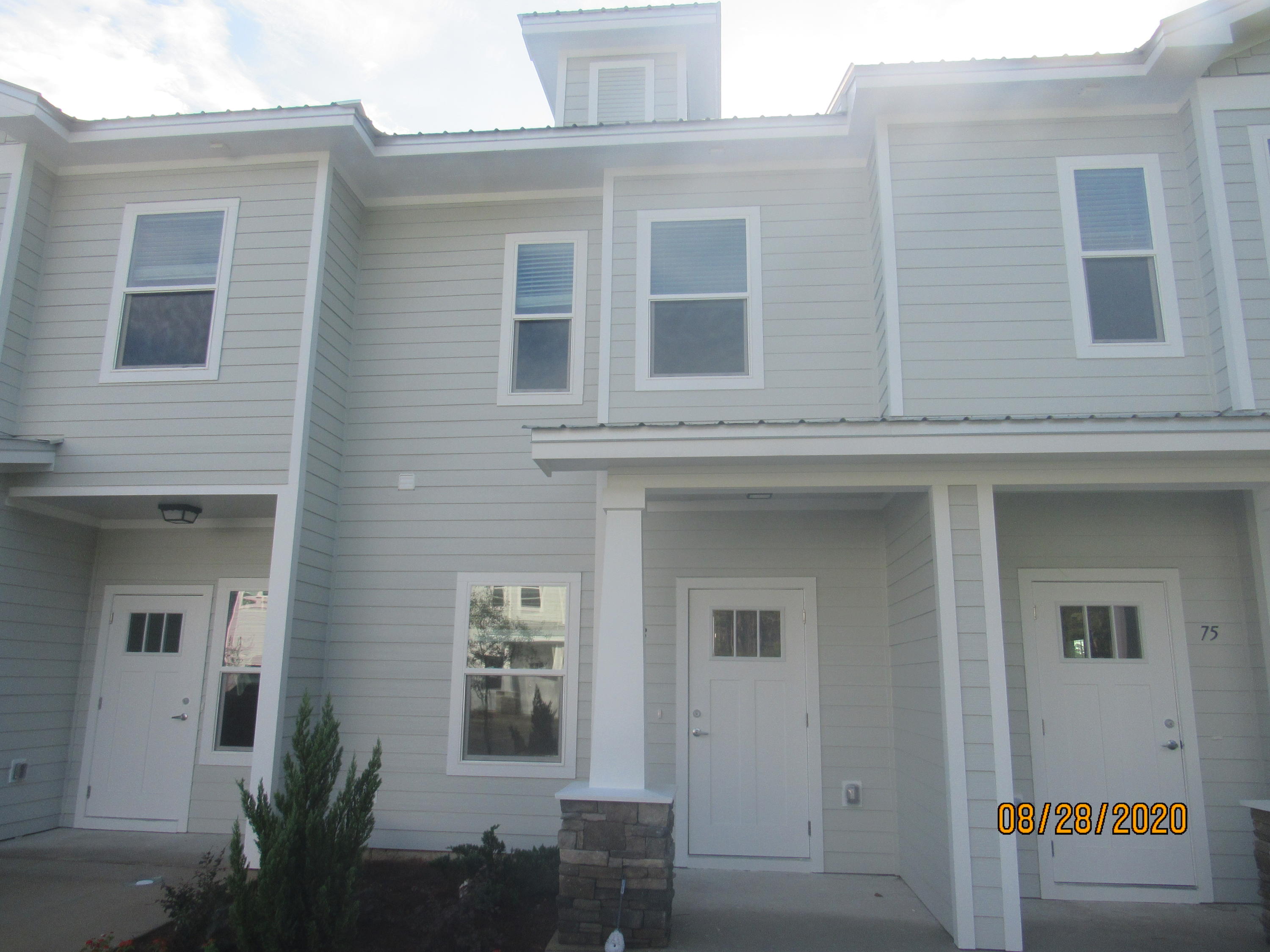 2020 built, 2 bedroom, 2.5 bath town home with upgrades and a community pool! This lovely home is across the street from an elementary school, just down the road from a Publix shopping center, and a short, easy commute to the sugar sand beaches and emerald waters of 30a/SOWAL. It has fresh, neutral paint and no carpet throughout. The open floor plan on the first level includes a nice size living room with nook, eat-in kitchen with breakfast bar, gorgeous counter tops, plenty of counter/cabinet space, stainless appliances (including a flat cook top stove), and a beautiful back splash, as well as a half guest bath with pedestal sink and a screened-in back porch. Upstairs, you will find two spacious bedrooms, each with their own full bath.  Also upstairs is the the laundry hook up (washer and dryer included in rental).  There is plenty of storage. Pool care, lawn care, and garbage are included in the rent. Pets may be considered on a case-by-case basis with prior owner approval and a non-refundable pet fee. NO SMOKING, INCLUDING VAPES.