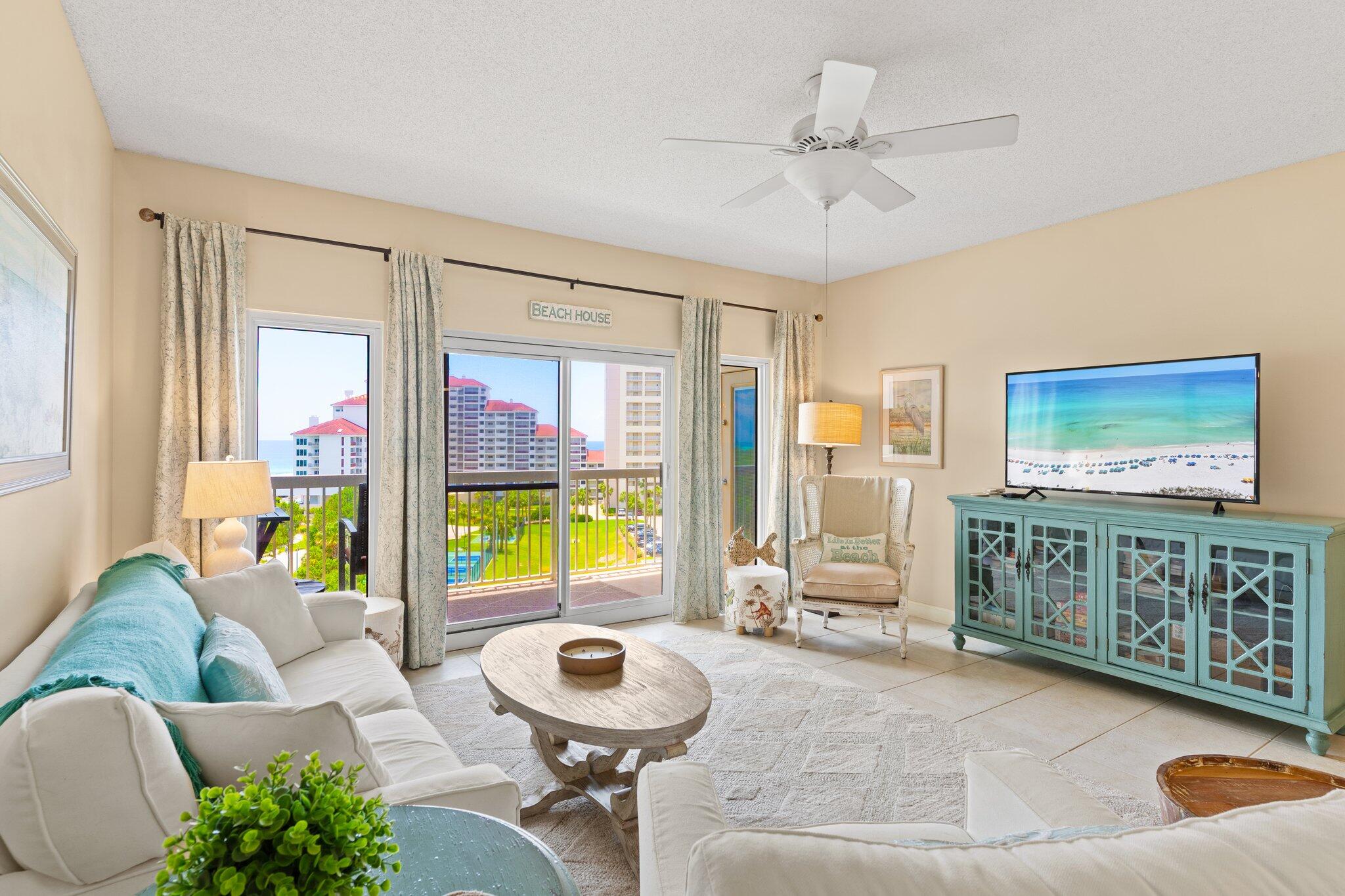 Views! Views! Views!  This delightful 2BR-2BA corner unit in The Summit at Tops'l Resort offers stylish accommodations and beautiful resort and gulf and western facing views. The sugar white beach is 200 yards away and the tropical swimming pool is just downstairs. Simply perfect describes this adorable unit decorated in a trendy coastal style.

Upon entry, an open kitchen with new stainless appliances looks right into the bright and inviting living and dining area. There is a guest bedroom with two full size beds and a hallway bathroom. There is a full size stacked washer and dryer in the kitchen as well. The master suite is located towards the rear of the unit and features windows on two sides with absolutely breathtaking views.