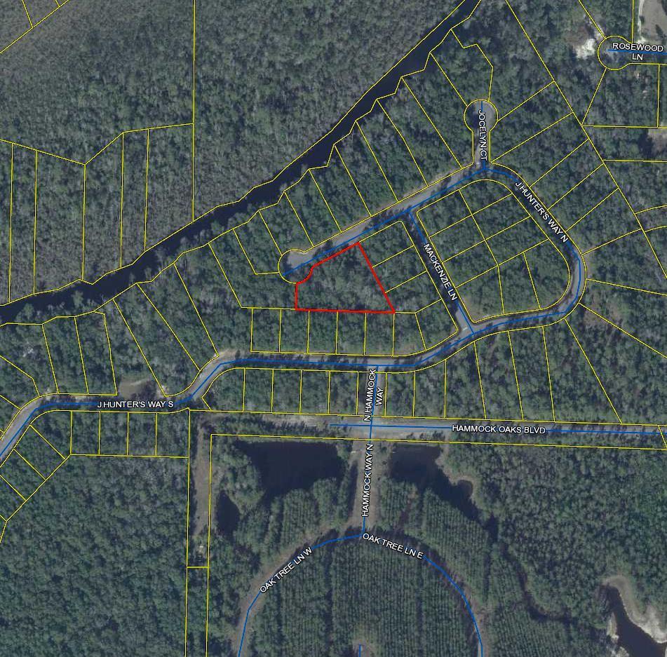 Magnolia Bay Estates is a gated, 79 lot subdivision that has 26 waterfront lots that borders Goodwin Creek.  All lots convey with water and sewer taps, there is a connection fee that will be due when starting to build your dream home.  Goodwin Creek is navigable out to Alaqua Bayou, Choctawhatchee Bay and to the Gulf of Mexico.  Large lot with native vegetation buffer that is protected.  Convenient location to shopping, restaurants, medical and schools.  Buyer(s) are responsible to personally verify all details for property and dimensions. Any information contained in this listing is believed to be accurate but is not guaranteed.