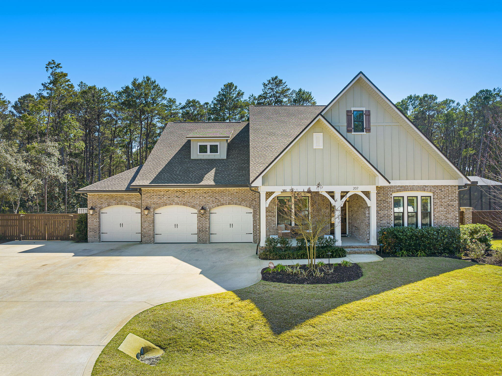 Welcome to Hunters Run, a respected enclave nestled in South Walton, mere minutes away from shopping, dining, schools, and the pristine White Sand Beaches adorning our Gulf of Mexico coastline. Prepare to be enchanted by this exquisite offering from Randy Wise Development - an enclave boasting oversized lots within a gated community.

Step into luxury with this 2021 custom-built, brick Craftsman masterpiece, featuring 4 bedrooms, 3 bathrooms, and an oversized 3-car garage. Relax and unwind in your private oasis, complete with a heated saltwater pool, hot tub, outdoor kitchen, and gas fireplace, all housed within the expansive screened-in lanai - perfect for entertaining guests year-round. As you enter, be greeted by the warm glow of gas lanterns illuminating your spacious front porch, flanked by a stunning glass and custom mahogany wood front door. Inside, discover a spacious entryway leading to two guest bedrooms, each offering privacy with a Jack and Jill bathroom boasting upgraded shower facilities. An additional bedroom, perfect for a home office, awaits just across the way.

Enter the main living area through brick archways accents, where an open floor plan seamlessly integrates the living, dining, and gourmet kitchen spaces. Enjoy the luxury of Cambria Quartz countertops, WOLF stainless steel appliances, and an oversized commercial Frigidaire fridge/freezer, all complemented by floor-to-ceiling custom lighted soft-close cabinetry.

Indulge in relaxation with the exquisite master bathroom suite boasting two expansive walk-in closets, a spacious oversized glass enclosed shower and a free standing soaking tub. 

Entertainment abounds with a state-of-the-art home entertainment sound system, featuring distributed speakers throughout the home and sonos outdoor speakers by the pool, ensuring every corner is filled with your favorite tunes. 

Warmth and coziness await with two fireplaces, one indoors and one outdoors on the expansive covered lanai. The seller has graciously included a wall-mounted outdoor TV. The outdoor lighting system with moonlights mounted high above creates the perfect atmosphere for entertaining into the late evenings. 

Privacy is paramount with custom wood and brick fencing surrounding the property, while tranquility awaits in the form of lush green Zoysia grass and professionally landscaped grounds. Additionally, a large concrete pad is provided for RV or boat parking, complete with water and power hookups.

Discover the epitome of modern family living with this impeccably designed home, boasting numerous upgrades and thoughtful touches throughout. Don't miss the unique rear exit from the master bathroom walk-in closet directly into the laundry room, providing seamless access without sacrificing privacy.  

This home truly has it all - from its exceptional design to its myriad of amenities. The list of upgrades is simply too long to list. Reach out today for a comprehensive features list. Schedule your private showing today to make this extraordinary residence your own.