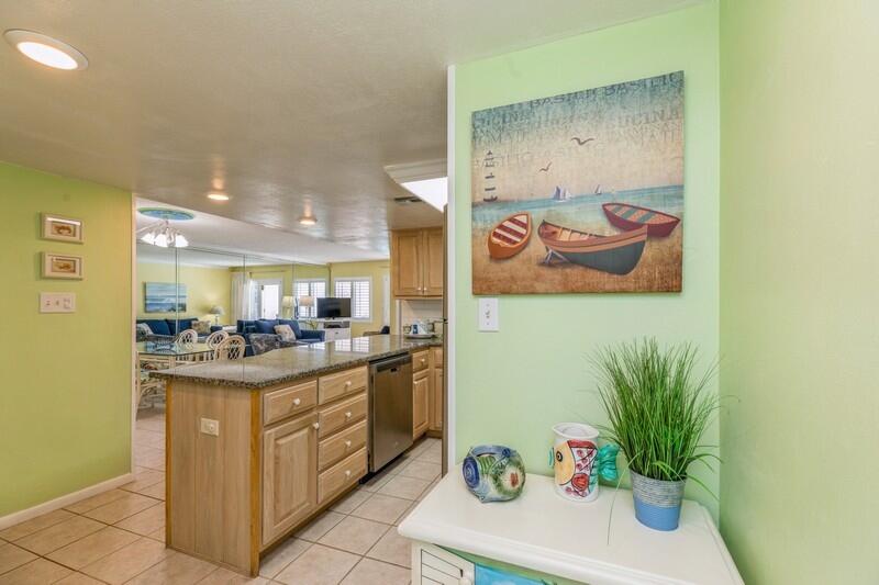 Come fall in love with the views from this gulf front condo.  Holiday Surf and Racquet Club is a highly sought after, gated community on Holiday Isle in Destin...directly on the beach!  This 2 bedroom, 2 bath unit features updated kitchen, bathrooms and NO CARPET making this a low maintenance condo a wonderful investment opportunity.  Comfortably sleeping 6, this unit comes fully furnished and rental ready.  On-site amenities include fitness center, laundry facilities, meeting space, shuffleboard, tennis courts, private beach, lobby and heated pool.  Come enjoy your own piece of paradise...perfect for a primary or secondary residence!