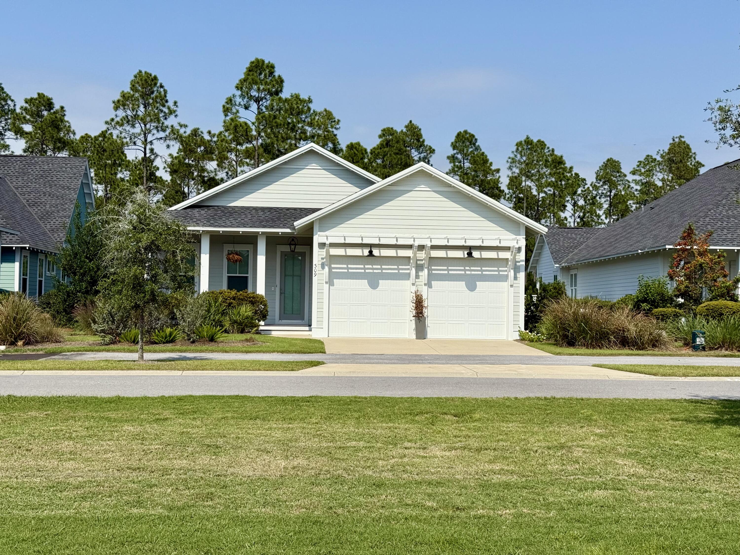 RECENTLY REDUCED BY $600 PER MONTH!! Newer-built, Watersound Origins home on one-level with 4 bedrooms and 3 bathrooms and a 2 car garage with epoxy flooring. This home is located on a premium lot with lots of privacy - facing a community park in the front and backing up to a serene pond surrounded by woods. Wood flooring throughout, solid core doors, high-end Bosch appliances, 10 foot ceilings, screened-in back porch, large master bedroom, 2-inch blinds already installed, crown molding, upgraded tile in bathrooms, dry bar in kitchen and laundry room with plenty of storage. Attic space above garage can also be used for additional storage.
Living in Watersound Origins means enjoying a neighborhood that values nature, recreation and community.  With no short-term rentals permitted, this home is ideal for a full-time resident or someone looking for a luxurious second home. From scenic walking trails to golf, tennis and pickleball courts, basketball and a community pool, this enviable location provides the perfect blend of convenience and tranquility.