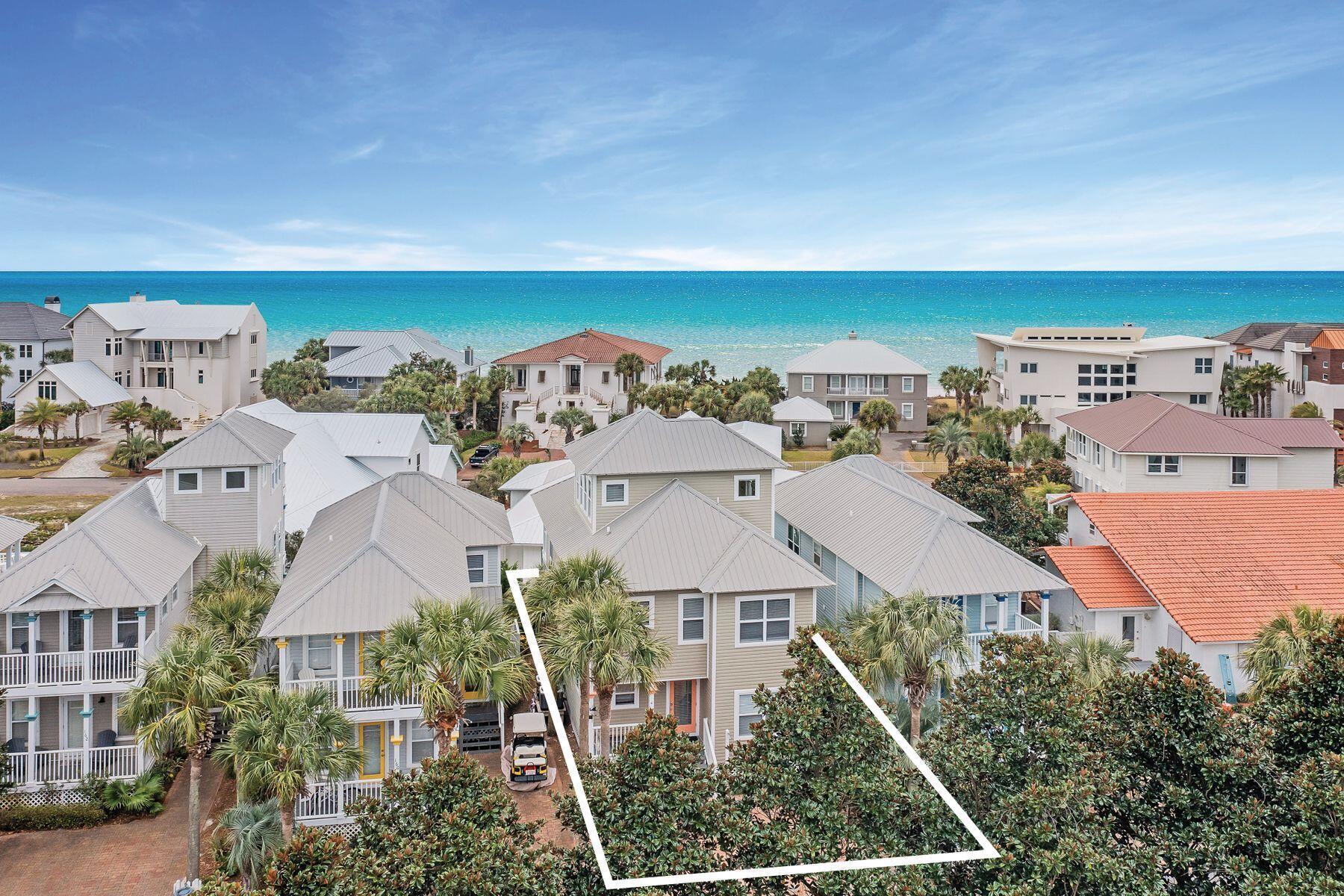 Now offered at $1,650,000.
Situated south of 30A in the beachside community of Old Florida Cottages sits this four-bed, three-bath home replete with relaxing porches and sunset views over the Gulf of Mexico. Be at the beach in moments with the nearby Gulfview Heights beach access or enjoy the community pool with family and friends. Current rental income is $75,000 with availability for bookings June ~ December.

The first floor of this fully-furnished home hosts a large king owner's suite with en suite including oversized shower and private access to the wraparound porch. Additional sleeping accommodations on this floor include a second king bedroom and a bunk room that share a bath. The second floor encompasses the living, kitchen and dining areas as well as an additional bedroom.  The third-floor tower room sleeps six with two sets of bunks
Notable updates to the home include new laminate flooring, a new dryer and two new water heaters. Rental income already on the books for 2022 with projections of $108,000. Ample parking is an added convenience. 

Old Florida Cottages offers low HOA dues and is positioned on the west end South of Scenic Highway 30A. Old Florida Cottages is a wonderful community with palm tree lined streets, lush tropical landscaping, winding brick walkways, white picket fences, and a sparkling pool with sun deck and large lanai. The beach is just a short stroll away. Golf, tennis, unique shops, and world class restaurants are within a few minutes drive. You won't find these amenities at this price elsewhere south of 30A.