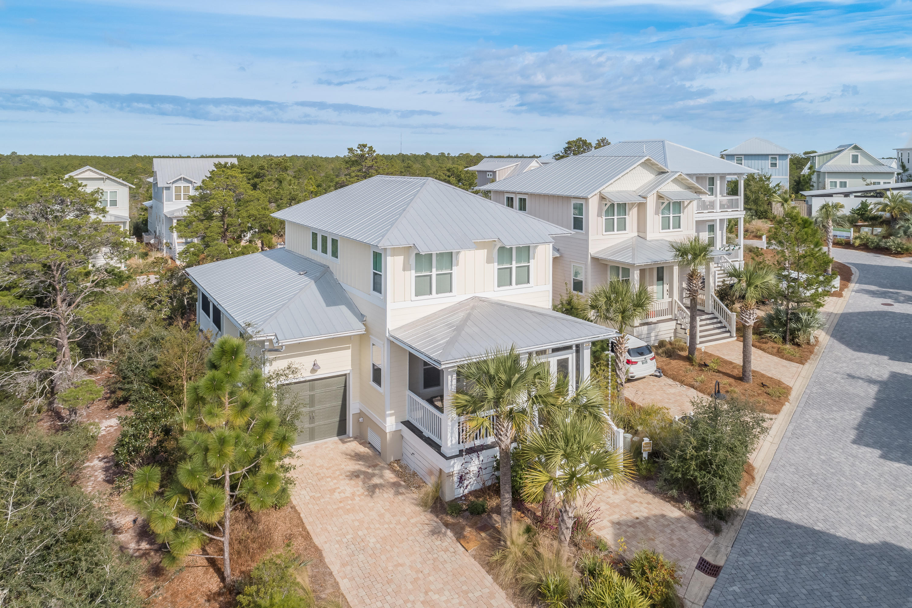 Highly upgraded 4 bedroom 3.5 bath florida cottage on one of the most coveted lots in Highland Parks on the West side of Scenic 30A! Centrally located to the beach, shopping, and dining all close by! This remarkable home sits on a quite rare interior lot that is close to the resort style pool while also backing up to green space preserve for added peace and privacy. Master Bedroom on the main level with a second Master upstairs! Covered/screened in porches both in the front and back of the home, along with an open design layout, makes this the perfect home for entertaining!! Multiple upgrades set it apart from the rest. Built to last and to withstand coastal weather with a concrete filled cinder block foundation, Hardie Board Exterior, impact windows, KDAT trim, 5-V Crimp metal roof, and closed cell insulation sealing the home from underneath. 

The features of the home include tankless gas water heater,  36'' gas range with vented hood, custom soft close cabinets / drawers, and GE Cafe' Series appliances. The first floor boasts 10 foot ceilings, 8 foot solid doors, and two step crown molding! Built with features that many homes in Highland Parks were not built with later, and multiple upgrades that this home boasts are abundant.  Meticulously maintained and recently repainted inside and outside.  Both porches were screened in and a paver patio section added, along with high end gutters and rain chain system added as well.  $45,000 in improvements / upgrades and paint done since purchased.  List of those items is available on request and attached in the documents section of the listing as well.
 
Proven rental history provides peace of mind.  Gross rents were $39,572 in 2017 and $42,408 in 2018, both with some owner usage so it could do more.  Projections are coming in at $50,000. 

Home is being offered furnished with a few personal exclusions!

Schedule your showing today this one won't last long!