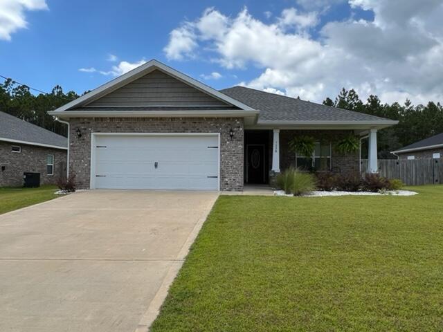 Better than New! Close to Beaches, Bases and Shopping! Clean, Fresh and Move-In Ready! This 3 bedroom 2 bath brick home located on a .35 acre lot was built in 2020 & has an open living room, dining room and kitchen all with Luxury Vinyl Plank flooring.  Sellers have added Plantation shutters, gutters and a beautiful kitchen back splash.  This split floor plan offers a Spacious Master Suite with a private entrance to the Covered Back Porch, Master Bath with Walk-In Tiled Shower w/2 Shower heads, 2 closets, a garden tub & double vanities.  The kitchen includes solid wood cabinets with soft close doors & drawers & 3cm Granite in kitchen and bathrooms.  High-end finishes include Double Trey ceilings in the living room & single trey ceilings in the kitchen and master bedroom, brushed nickel fixtures, lever style door handles, crown molding in the treys & more!  There are covered porches in front and in back. The fenced portion of yard is sodded, irrigated (lawn pump/Sprinklers) and part of back yard is natural and not included in privacy fenced area. Sellers have a termite bond and have added some lovely landscaping.  Washer/Dryer are negotiable.  Spacious Garage is 20'x22'!  Call to see this Beautiful Home Today!
