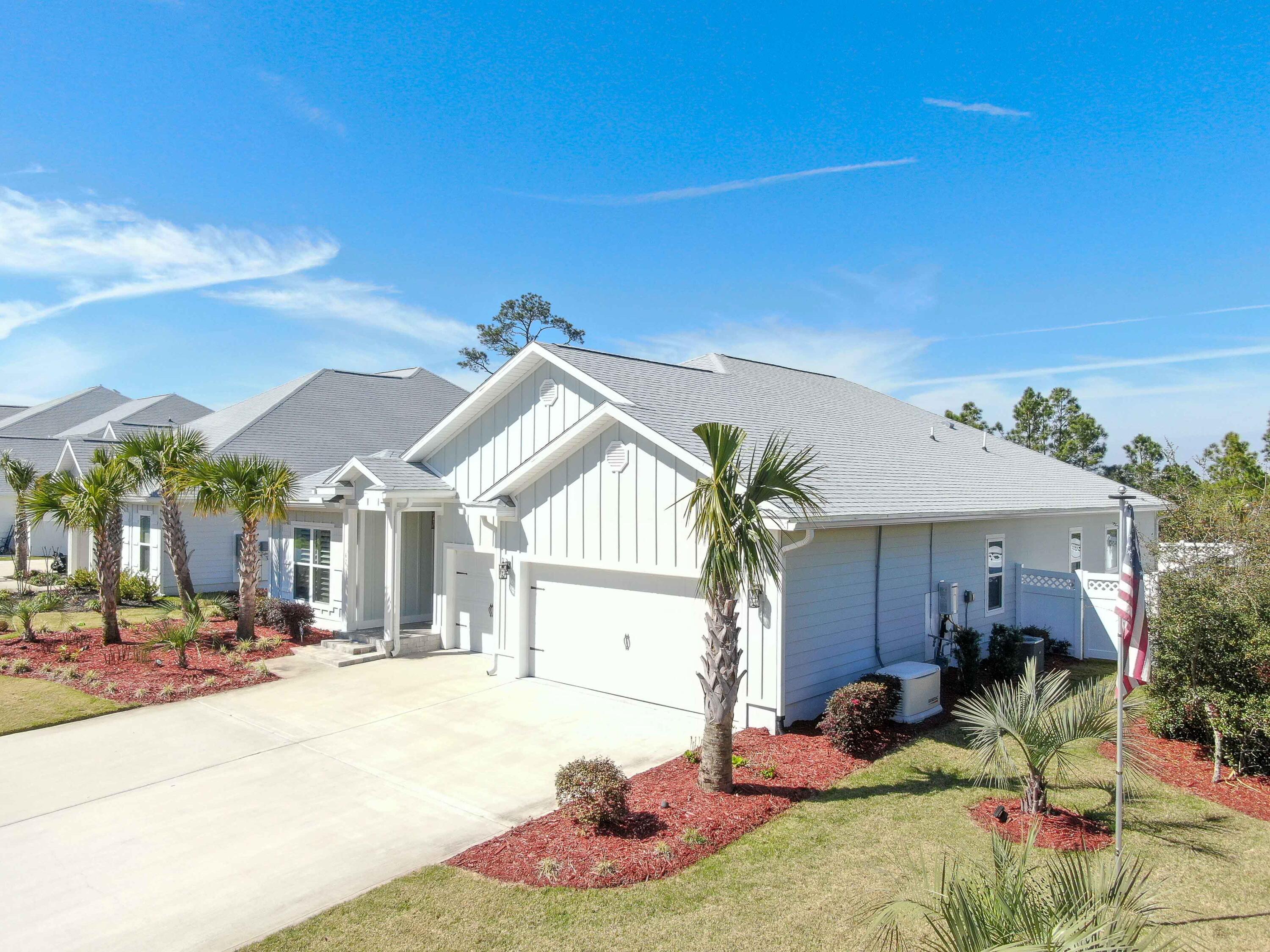 Ideal for a primary or secondary residence, this single-story home features a 3-car garage and is available for long-term rentals only. Located in a peaceful, family-friendly neighborhood with low HOA fees, it's just a short golf cart ride to four public beach accesses. 

The home boasts curb appeal with updates and renovations, including a welcoming front yard with seven newly planted palm trees, flowers, and Zoysia sod. Inside, this one-level, 4-bedroom (plus bonus room), 4-bathroom home is adorned with tasteful interior touches such as tiled walk-in showers, wainscoting, textured wallpaper, ambient lighting, soft-close drawers, plantation shutters, built-in custom closets, a grid wall, designer window treatments and electric fireplaces in the living & master bedroom areas. The exterior features continue with a covered patio updated with tiled flooring and remote-controlled screens. Two steps down, you'll find a stunning Trex deck featuring a gas-lined firepit. The outdoor grilling area, also equipped with a gas line, is ideally positioned for outdoor living. The entire yard is enclosed by an 8-foot white vinyl fence.
The climate-controlled 3-car garage with epoxy flooring can accommodate two cars and a golf cart. Additional features of the home include an oversized laundry room with custom cabinetry, and plenty of space for folding clothes. An ADT security system and a whole-house Generac generator are also installed.
The owners have invested over $270,000 in updates and renovations. 
Situated less than a mile from the stunning beaches of 30A, a quick golf cart ride offers access to the beach and numerous restaurants, such as Stinky's, Shunk Gulleys, The Perfect Pig, and The Vue. Additionally, the sellers are including a 6-passenger golf cart and an infrared sauna.