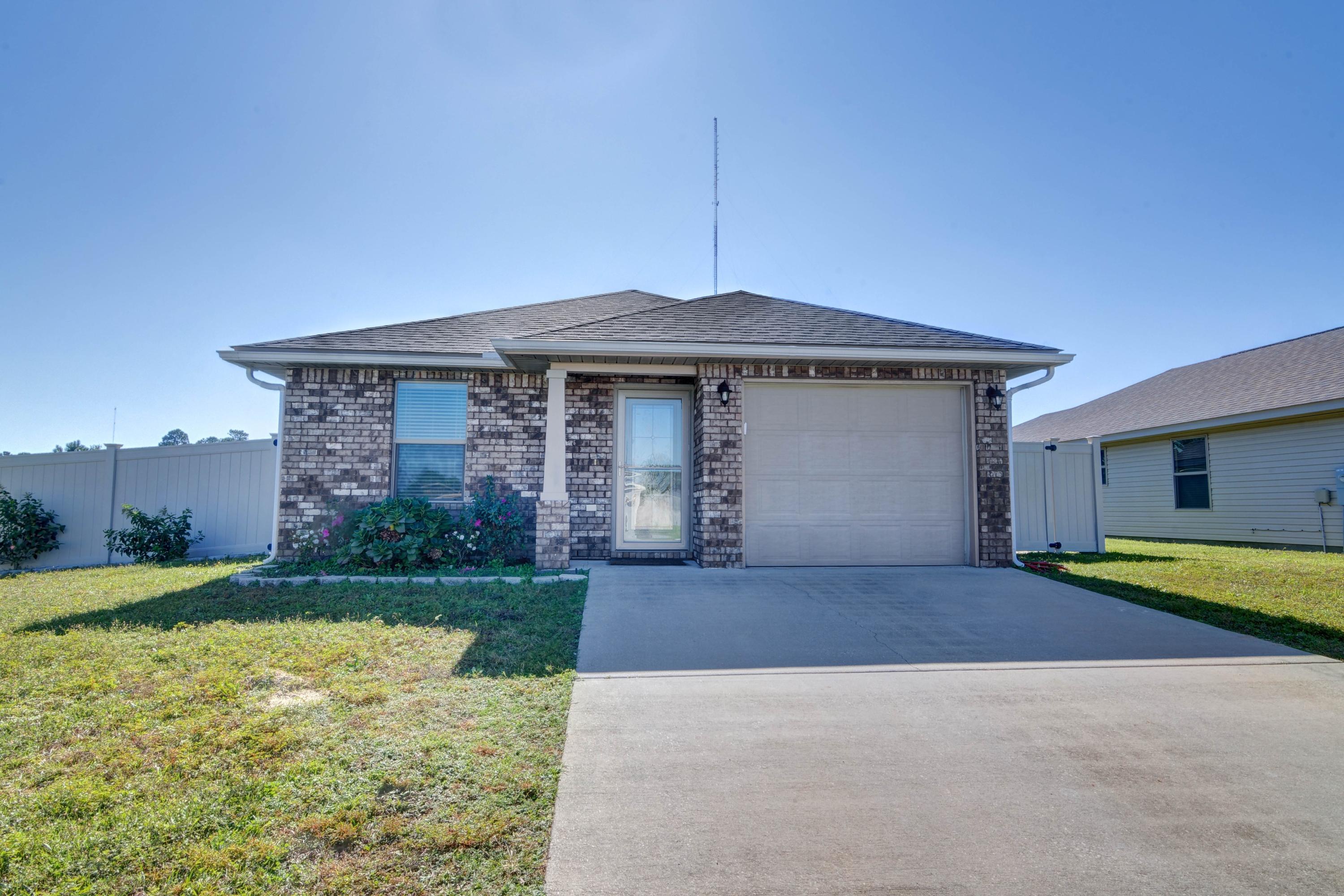 *Investor opportunity alert!* Welcome to this beautiful home in the popular neighborhood of Shadow Lakes with a tenant already in place! Featuring 3 bedrooms, 2 baths on a corner lot this is the updated and turnkey rental property you've been searching for that's only 5 years old! Appreciate newly installed easy upkeep hardwood look tile all throughout the property (no carpet, the current tenants just have large rugs), faux wood white blinds throughout, and updated bronze finishes. Each bedroom features custom wood closet built-ins and the fully updated kitchen has stainless appliances and granite countertops! All appliances will convey with the sale, including the washer and dryer. Enjoy additional seller updates like the beautiful vinyl backyard privacy fence and large backyard storage  building. This community features underground utilities and a community playground with easy and convenient access to Hwy 98 and Hwy 399. Tenant currently pays $1400/mo. Don't miss out on this adorable gem!