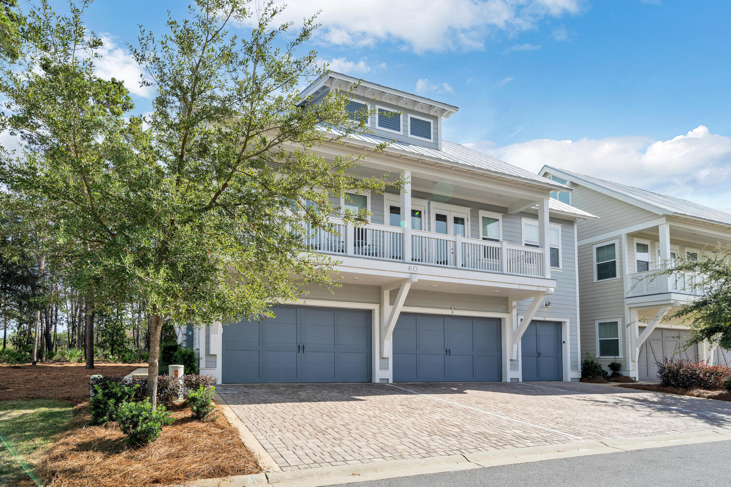 Fully furnished coastal chic beach house that backs up to a Wildlife Park Preserve with no new construction allowed to be built behind this home.This beautiful townhome is located in the highly sought-after community of Prominence North on 30A near the HUB/Big Chill- a great place for open dining and entertainment. Upgraded to include granite counter tops, soaring 12 foot ceilings, and beautifully updated flooring throughout the whole home including bedrooms. This exquisitely designed home includes a two-car garage, and 6-seat golf cart everything you need for a perfect beach home. Owner is keeping three drawer dresser in master bedroom and replacing with a tray table.