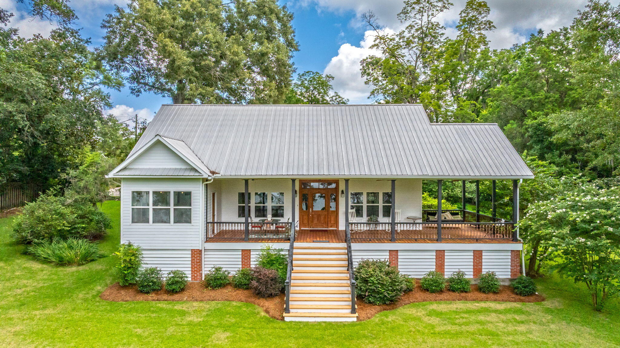 Lake Jackson living at its finest in this one in a lifetime opportunity purchase!  4-bed, 2-bath home in Florala, AL offering entertaining space galore all while enjoying the water views. The homes standout features include the large front porch, recently renovated in 21 that offers a perfect spot to enjoy your morning coffee. Inside, you'll find four roomy bedrooms filled with tons natural light through oversized windows. Home offers everything you are looking for to include a large living, kitchen, and dining room, and huge laundry room. Property includes a deep irrigation well and a brand-new HVAC installed in 24. For added security during severe weather, there's an impressive storm cellar located beneath the house than can also be used for storage. MUST SEE