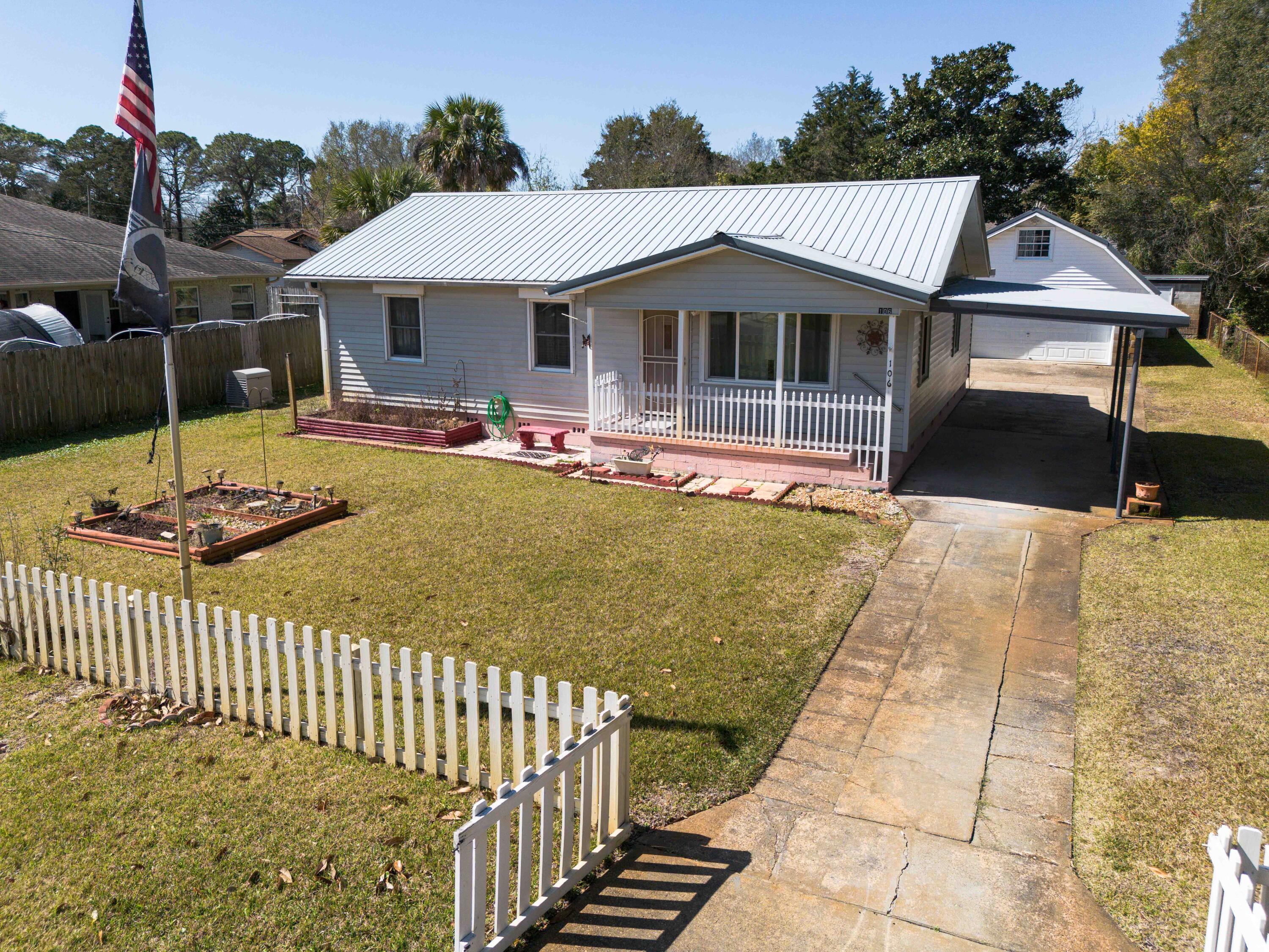 Charming Mid-Century Modern Gem - Perfect for Homeowners & Investors! Step into this cozy cottage-style retreat, offering the perfect blend of charm and convenience. Ideally located just minutes from Eglin and Hurlburt, a boat ramp,  the beach, a city park and pickleball courts. Bring your jet skis and kayaks—there's plenty of garage space to store them, plus a 6' high loft above for extra storage! Enjoy peace of mind with installed handicapped grab bars, hurricane shutters, and a reliable Kohler generator for storm protection. The spacious 16' x 13' covered deck is perfect for entertaining. Whether you're looking for a charming retirement getaway or a lucrative short-term or long-term rental investment, this home is a fantastic opportunity. Schedule your showing today!