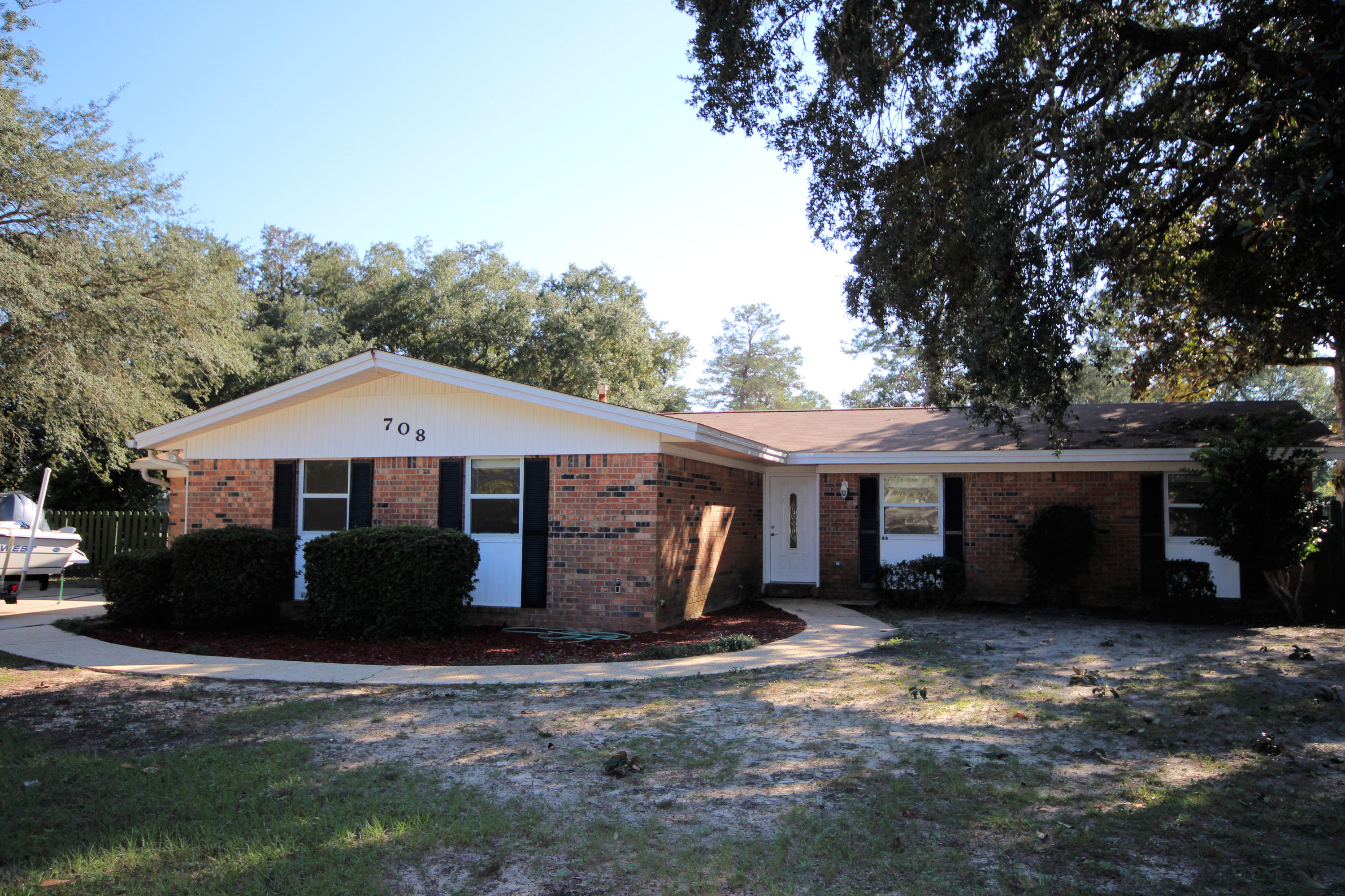 Under Contingent Contract - 72 hr Kick Out Clause. Super Location for Eglin AFB or Hurlburt Field. ROOM TO GROW! Looking for space? This house has it! All Brick Pool Home on an almost half acre DOUBLE LOT in Fabulous KENWOOD. Rare Opportunity. Like to Entertain? Love Pool Parties? HUGE Family Room with Fireplace and Wet Bar. Large Spacious Kitchen with Eat-In Area. New Stainless Range/Oven and Refrigerator! Dining Room. Master Suite has attached Man Cave. Enclosed Florida Room. Screened Patio. Open Pool Deck and Gazebo. 2 Yard Buildings and a Pool House with Bathroom - all with Power! Park Your Boats / RV on Either of 2 Driveways. Priced to Sell and Looking for it's new
Buyer to verify measurement Owners. REWIRED with COPPER Mar 2018! NEW ROOF end of 2017! You Need to See This One! We have an estimate to convert garage back to a garage.