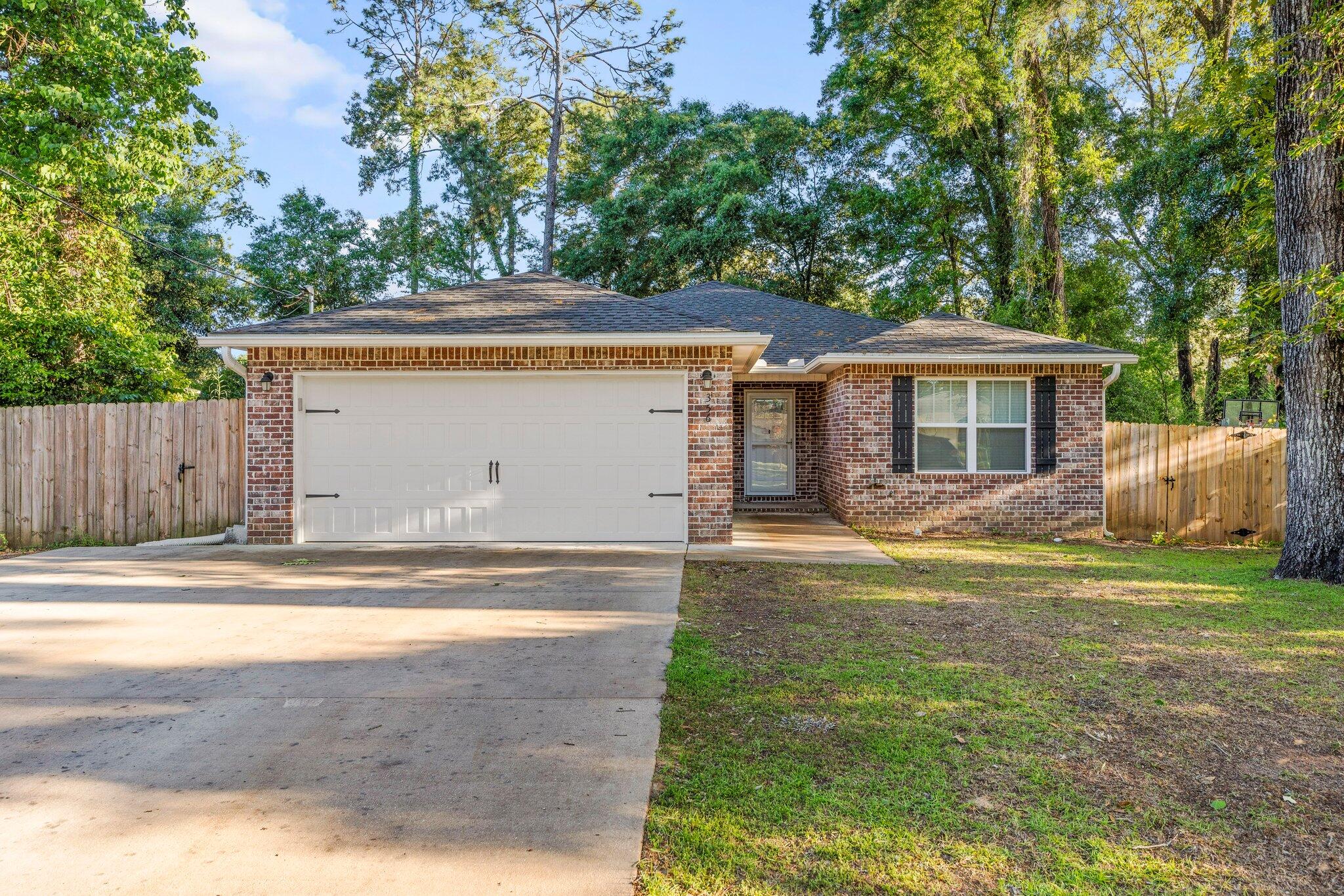 This beautiful brick, single owner home is ready with all the updates you want! Newly constructed in 2020 you won't have to worry about age of roof, water heater, or HVAC saving thousands of dollars in possible replacements. Appliances are still covered under the original 10 year warranty.  Conveniently located two lots down from Bob Sikes Elementary School! Granite counters, stainless appliances and a tile floor make spending time in the kitchen a pleasure. With an open view of the living area that boasts LVP floors, you can entertain easily. Expand that entertainment with quick access to the large privacy fenced backyard to include a fire pit and additional storage shed.  The large primary bedroom with its own en suite bathroom and walk in closet add comfort when it's time to unwind for the day. With all the conveniences of a newer home, ease to schools and shopping, all while nestled in a mature neighborhood, this one is certain to check all the boxes!