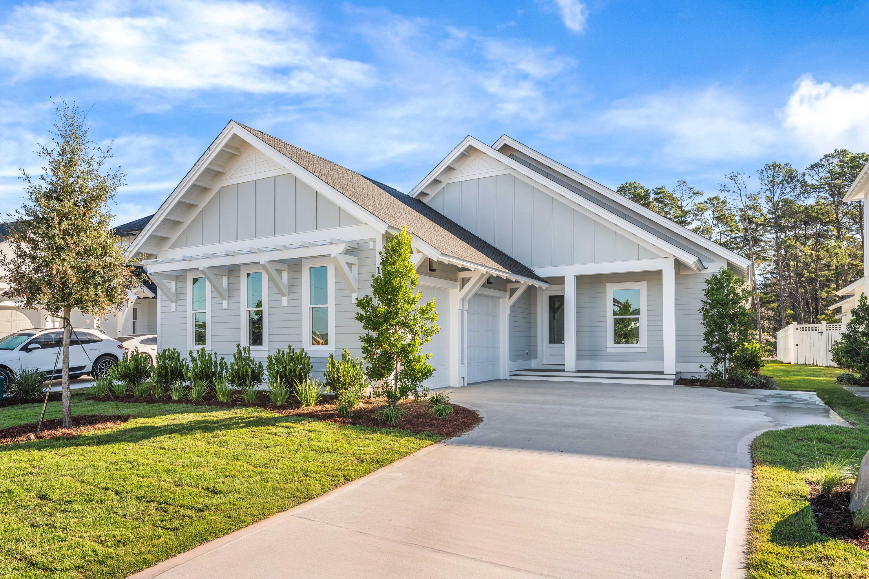 Refined Coastal Living in Watersound Origins - Powell Landing East. Experience the best of 30A living in this, newly built, beautifully designed 4-bedroom, 4.5-bathroom home located in the highly desirable Powell Landing East section of Watersound Origins. Offering 2,448 square feet of thoughtfully planned, single-level living, this home blends coastal elegance with everyday comfort — perfect for families, professionals or retirees seeking a relaxed, resort-style lifestyle.
Elegant, High-end Interiors: Step through the front door and into an open-concept living area wrapped in shiplap accents, 10-foot ceilings, and natural light. The living room features a gas fireplace with custom surround and an 85'' Samsung Neo QLED TV — ideal for cozy nights or entertaining... Enjoy rich details throughout, from solid-core interior doors and crown molding to quartz countertops and wide-plank flooring.
The chef's kitchen is both beautiful and functional, boasting Thermidor appliances, a 13-foot extra-deep island with storage in the back, solid quartz countertops that continue into the backsplash, and upper cabinets extended to the ceiling with interior-lit, glass fronts. A built-in KitchenAid wine and beverage cooler adds a touch of luxury for hosting.
Each of the four bedrooms is an ensuite, providing privacy and comfort for family and guests alike. A brand new washer and dryer are included, and the home has a security system installed (monitoring optional).
Outdoor Living & Upgrades: Step out to your screened-in lanai overlooking a large fenced backyard (lot size approx. 58' x 140') backing up to peaceful woods  perfect for morning coffee, evening gatherings, or simply enjoying the quiet coastal air. The garage features epoxy flooring, a utility sink with faucet, additional fridge and freezer, and ample attic storage.
Built-in audio speakers in the living room and lanai let you stream music directly from your smartphone, enhancing the relaxed Florida atmosphere.
Watersound Origins Lifestyle: Living in Watersound Origins means more than just a home  it's a lifestyle. Enjoy access to the community's 10-hole executive golf course, state-of-the-art fitness center, tropical-themed pool, pickleball, tennis, and basketball courts, and miles of walking and biking trails. You're minutes from 30A's white-sand beaches, boutique shops, and local dining  yet tucked away in a serene, family-friendly neighborhood.  Offering a lifestyle of both modern convenience and appreciation of the natural environment, the 1,400-acre WaterSound Origins community is located near all the highlights of South Walton including beaches, shopping, and dining. Amenities include the Village Commons with resort style swimming pool, an events lawn, fitness center, and sports courts plus parks, walking trails, and access to Lake Powell with complimentary kayaks for residents' use. Origins Golf Club is a six-hole regulation short course located within the community that also plays as a nine-hole executive course or a 10-hole, par-3 layout. The growing WaterSound Origins town center at the front of the neighborhood includes a Publix grocery store, multiple restaurants, and other services. Owners have the opportunity to join the WaterSound Club with multiple amenities to members including private beach access, beach services, swimming pools, dining, two private golf courses, and the brand-new Lifestyle Center at Camp Creek.

This exceptional property combines coastal sophistication with modern comfort, offering everything needed for a seamless long-term stay in one of 30A's most desirable communities.

Please Note: Minimum 1 year lease required. All information, including but not limited to, dimensions, lot size, etc. is deemed to be accurate but not warranted - and to be verified by the renter if they choose.