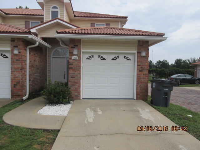 This townhouse (only 1.5 from Eglin AFB back gate) has so many beautiful upgrades that you'll be amazed. This is a larger end unit with a garage. The inside is gorgeously appointed with hardwood flooring in main living area, tile in the bathrooms, granite countertops, stainless steel appliances, cultured marble bathtubs and vanities, crown molding and beautiful fan windows. Unit also comes with washer and dryer (not warranted for repairs or replacement). Just a stone's throw away from the elementary school. No smoking. No pets. Showings by appointment only.