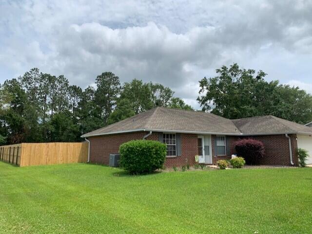 Well maintained Home on 1 acre, including beautiful updated  Appliances , Hardwood Flooring in Bedrooms, Laminate Wood in Great Room & Formal Dining, Tile in all wet areas, Covered Patio with a Hot Tub and Outdoor Kitchen area, Workshop area with a 24x30 Garage, Workbench, A/C, 30 amp RV Hookup outside the Garage, 20x20 Garage with Double Garage Doors, Huge Privacy Fenced Back Yard, Irrigation Well & Sprinkler