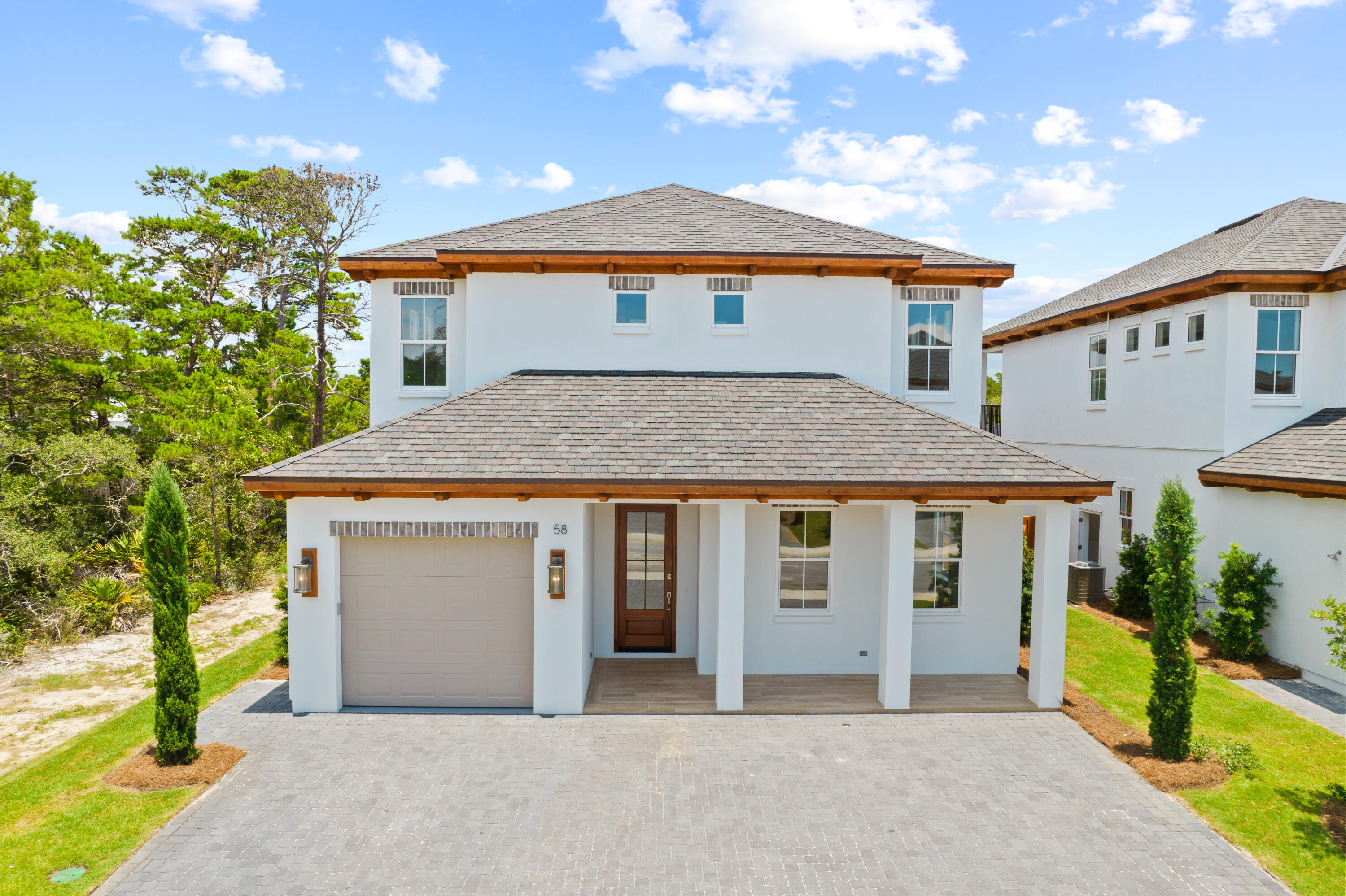 Incredible new construction home just north of 30A! Furnished & turn-key! This 4-bedroom house boasts 2 master bedrooms (1 on each floor), 2 living areas and a separate sleeping space with custom built-in bunk beds. Once you enter the home you are welcomed with raised ceilings, shiplap walls and a resilient wood look tile flooring. As you progress through the open floor plan the kitchen is sure to catch your attention with a commercial grade 66in refrigerator/freezer, 6-burner gas cooking station and stainless-steel appliances. The first level master bathroom features a custom tile shower and standalone soaking tub. Upstairs you will find an additional oversized living area complete with beverage cooler, the 2nd master bedroom with access to the rear balcony, 2 guest bedrooms each with private bath and custom bunk area. Back downstairs, once you open the sliding glass doors and step out onto the covered patio, this is an entertainer's dream with a built-in gas grill, outdoor lounge area and a private pool complete with a gas heater. While this home is a perfect primary or second home retreat, it is a strong investment opportunity with rental income projections exceeding $100K from a local management company. From Carefree Lane, you are just north of Gulf Place and the Ed Walline Beach access on 30A, with multiple restaurants (Shunk Gulley, Local Catch, etc.) coffee shops & entertainment venues within a short proximity.
