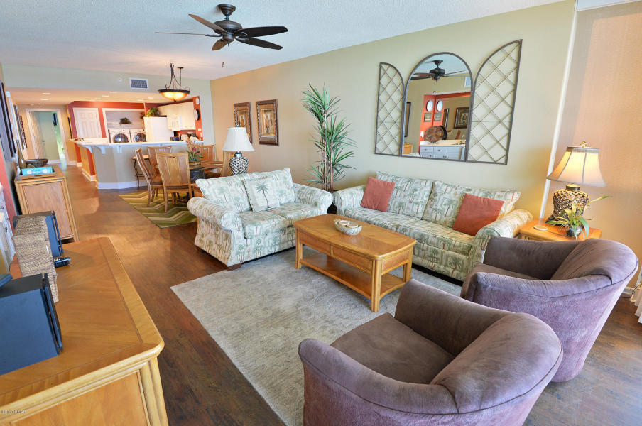 This coveted 3bed/3bath eastern facing corner unit located in the desirable Majestic Beach Resort condo is the thing of which dreams are made. Almost 1700 square feet of seaside luxury with a toes-in-the-sand location on the stunning beaches of Panama City Beach. Panoramic Gulf views at nearly every window. An expansive L-shaped balcony is accessed from the living room and master suite providing the ultimate alfresco living and entertaining environment. Located on a corner of the 10th floor of the magnificent Majestic Beach Towers Resort II, this condo features custom touches such as hardwood floors throughout and a tiled master bath. Nine-foot walls with floor-to-ceiling windows and glass doors in an open floor plan provide incredible views