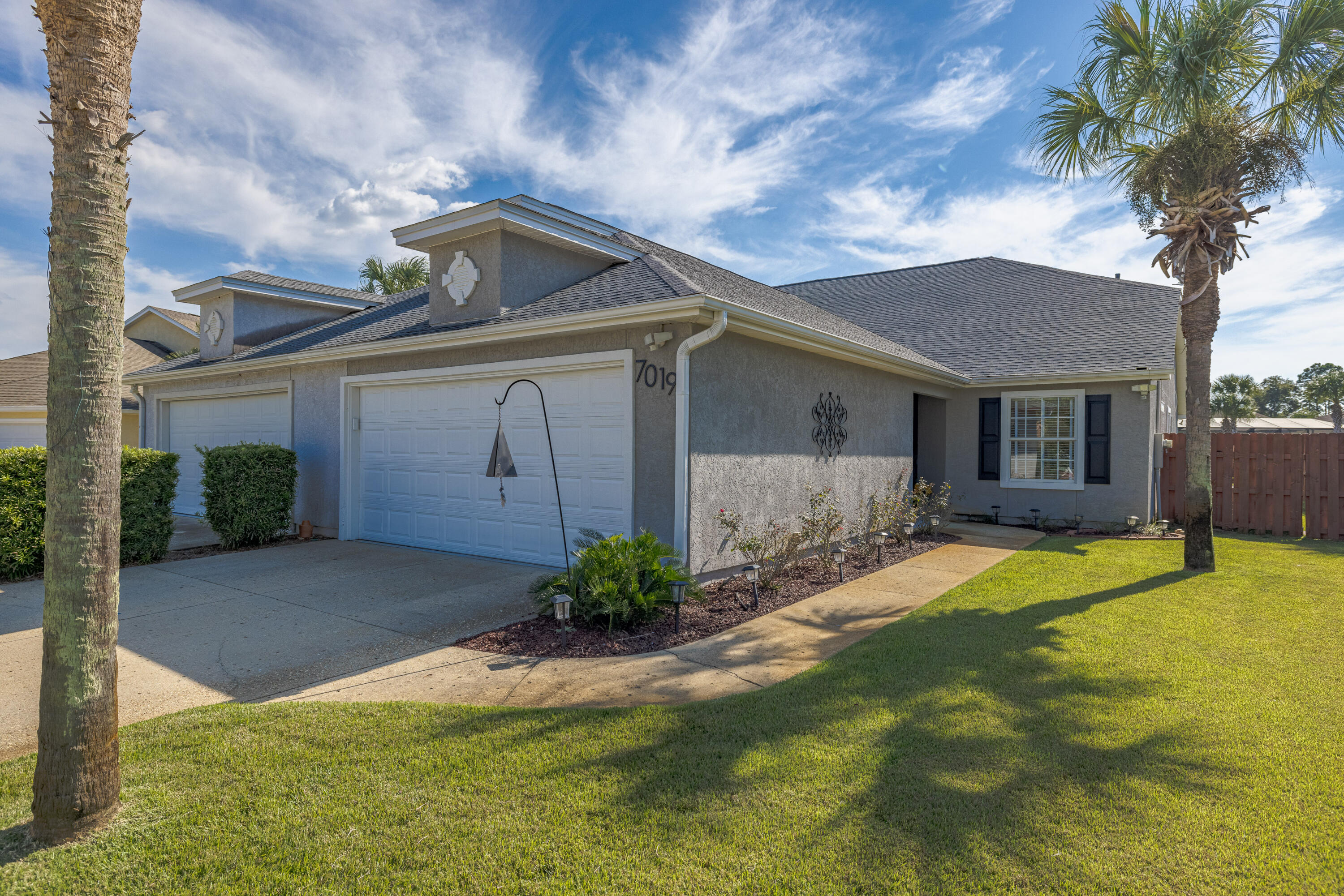 Discover this wonderful one-level townhome in the gated, waterfront community of Dolphin Bay. This beautifully updated home features an open floor plan, perfect for entertaining, with sliders leading to a spacious extended patio and a generous backyard—ready for a pool! The modern kitchen boasts quartz countertops, while recent upgrades include a new roof and HVAC system (both just 2 years old) and a brand-new tankless water heater. Enjoy ultimate privacy with a fully fenced backyard and an additional private fenced area. Dolphin Bay offers more than just a great home—it's a lifestyle. With low HOA fees of only $360 a quarter, residents have access to a private marina, boat storage, tennis courts, a picnic area, and a dock. SEE ADD REMARKS FOR FULL DESCRIPTION Conveniently located near the Navy Base, local restaurants, and just a short drive to Pier Park and our gorgeous beaches. Don't miss out on this rare opportunity to live in one of the area's most desirable communities!