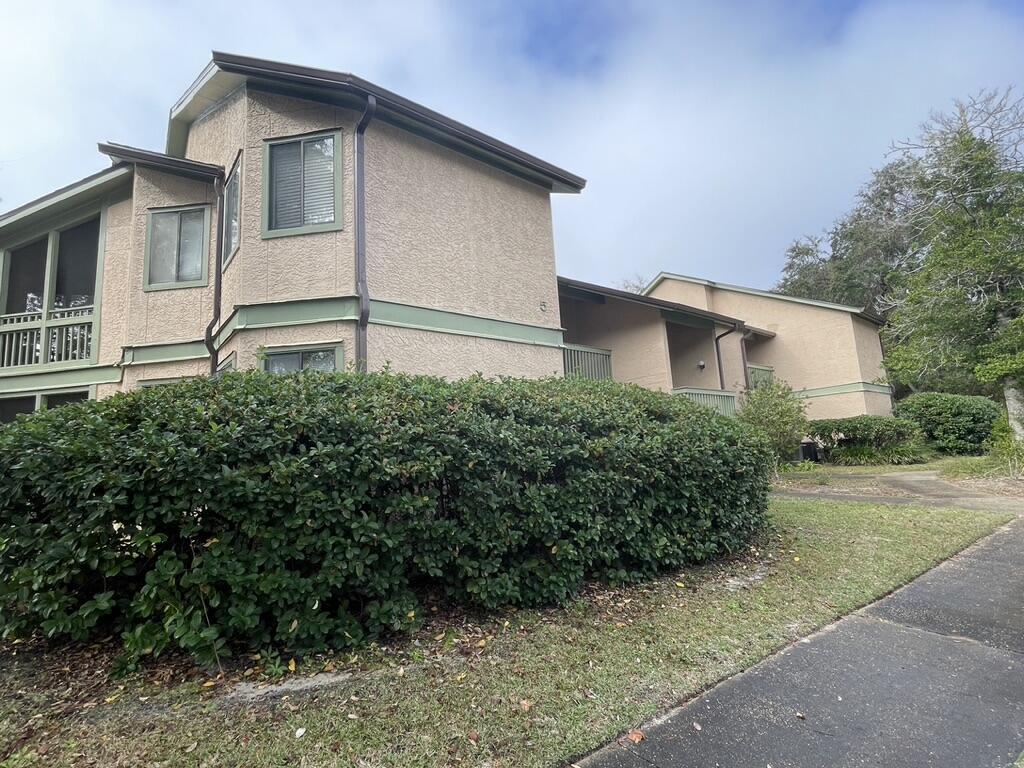 First Floor Garden Oaks Condo located within Bluewater Bay. This 2 bedroom condo has an open concept living area and offers a private screened patio. Off of the kitchen is a small utility closet with a full size washer and dryer, which is provided AS-IS. There is a screened balcony with doors opening to the both Bedrooms. Each unit has an assigned parking spot in front of the building. Water and Trash are included. Nearby schools, military bases, restaurants, and shopping make this area ideal location. No Pets.