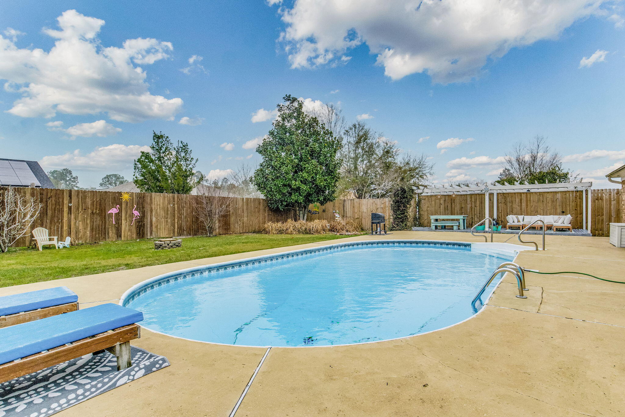 Over $54,000 in rental income per year! FULLY FURNISHED and turn-key ready to rent! Comes with rentals on the books for 2024 & 2025 with over 3 years of past rental history. This residence boasts a captivating backyard oasis, complete with a swimming pool, gazebo, and a entertainment area outfitted with a sectional sofa, creating the perfect setting for relaxation and social gatherings. Upon entering this home, guests are greeted by dual living areas that offer an ideal space for hosting and enjoyment. Adding to the charm is a cozy coffee bar, inviting you to savor a warm cup of coffee. Comfortably accommodating up to 10 guests, this home ensures a restful stay for all. The expansive master suite features a dedicated workspace, a cozy seating area, and a private en suite bathroom, offering a secluded retreat within the home. Nestled in a serene waterfront community, this property offers access to exclusive amenities, including a private beach, pier, and kids playground, enhancing the lifestyle of its residents. Its prime location is merely a 5-minute drive from Naval Air Station Pensacola, and 15 minutes from the pristine, sugar-white sands of Perdido Key and Orange Beach. Additionally, Grande Lagoon, a component of the Florida Intracoastal Waterway System, is within a short stroll, providing a gateway to Pensacola Pass via a brief 5-minute boat journey. This home is not just a place to live as a primary or secondary home, but a gateway to a lifestyle of leisure and the possiblity of a vacation rental for income. Roof is 2021.