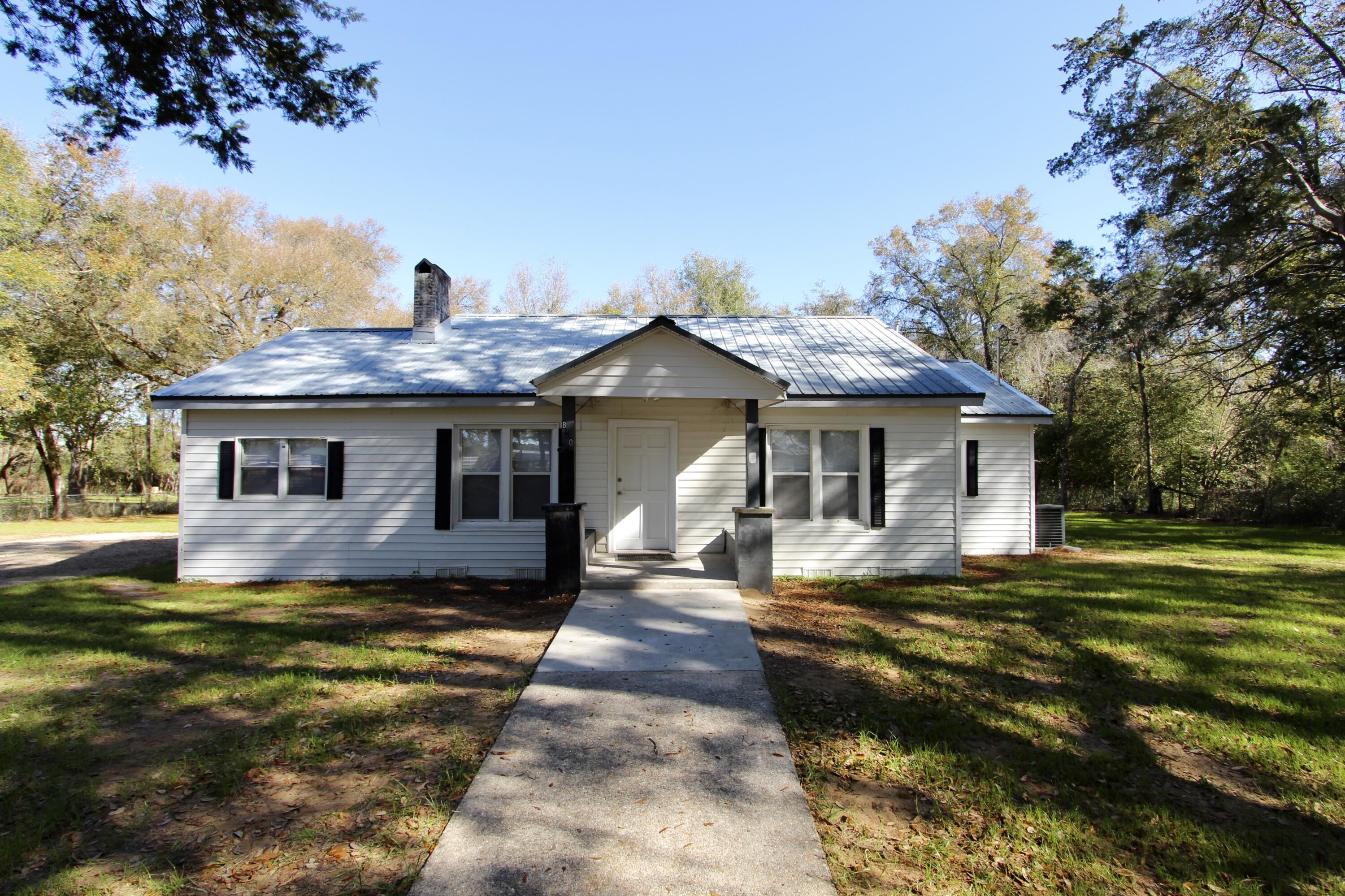 This beautifully remodeled home offers a fresh and modern feel while maintaining a classic layout. With brand-new flooring, fresh paint, and stylish updates throughout, this home is both inviting and functional.
The separate kitchen features well-maintained appliances in excellent condition, sleek countertops, and plenty of cabinet space for storage. The cozy living room provides a comfortable space to relax and unwind. Spacious bedrooms offer great natural light, and the updated bathrooms boast modern finishes. Additional upgrades include new electrical, plumbing, and HVAC, ensuring a hassle-free rental experience.
 Step outside to enjoy the backyard deckperfect for relaxing, grilling, or entertaining guests. The large yard, surrounded by mature trees, offers a peaceful outdoor space to unwind.